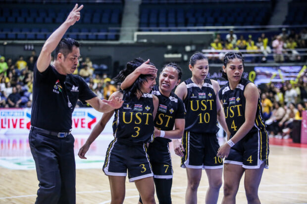 UST Growling Tigresses celebrate UAAP Women's basketball crown.