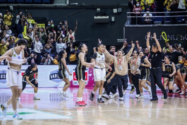 Coach Haydee Ong, Tantoy Ferrer and the UST Growling Tigers celebrate UAAP Season 86 women's basketball title. –MARLO CUETO/INQUIRER.net