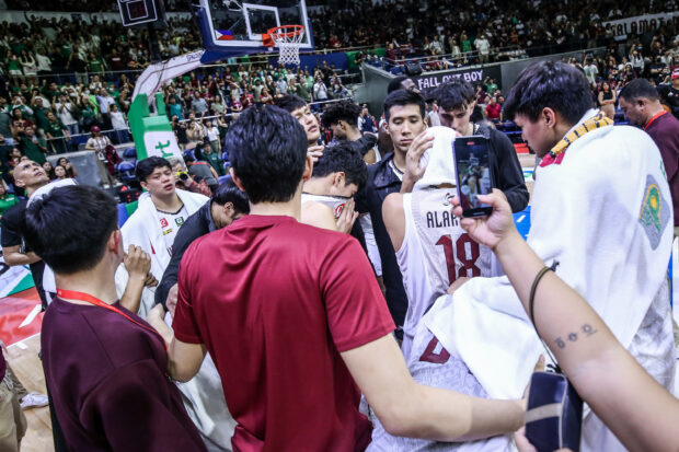 UP Fighting Maroons after losing the UAAP Season 86 men's basketball final against La Salle.