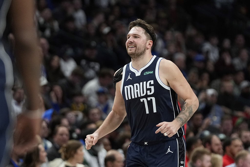 Dallas Mavericks guard Luka Doncic (77) reacts to a play during the second half of an NBA basketball game against the Portland Trail Blazers in Dallas, Wednesday, Jan. 3, 2024. 