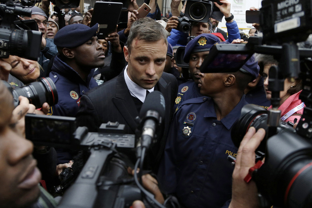 FILE - Oscar Pistorius leaves the High Court in Pretoria, South Africa, on June 14, 2016 during his trail for the murder of girlfriend Reeva Steenkamp