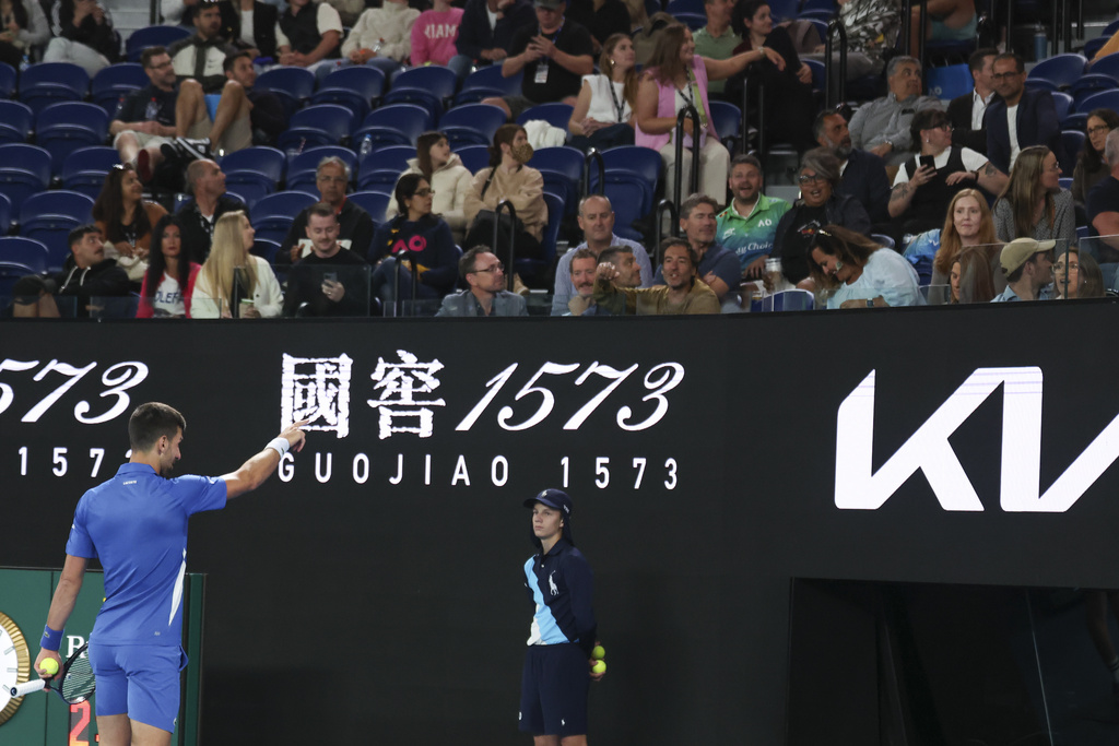 Djokovic confronts heckler in testy win at Australian Open 2024
