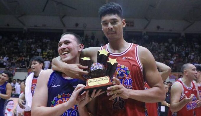 Robert Bolick (left), who nailed a “legendary” basket to cap the All-Star game, shared the MVP trophy with —PBA IMAGES