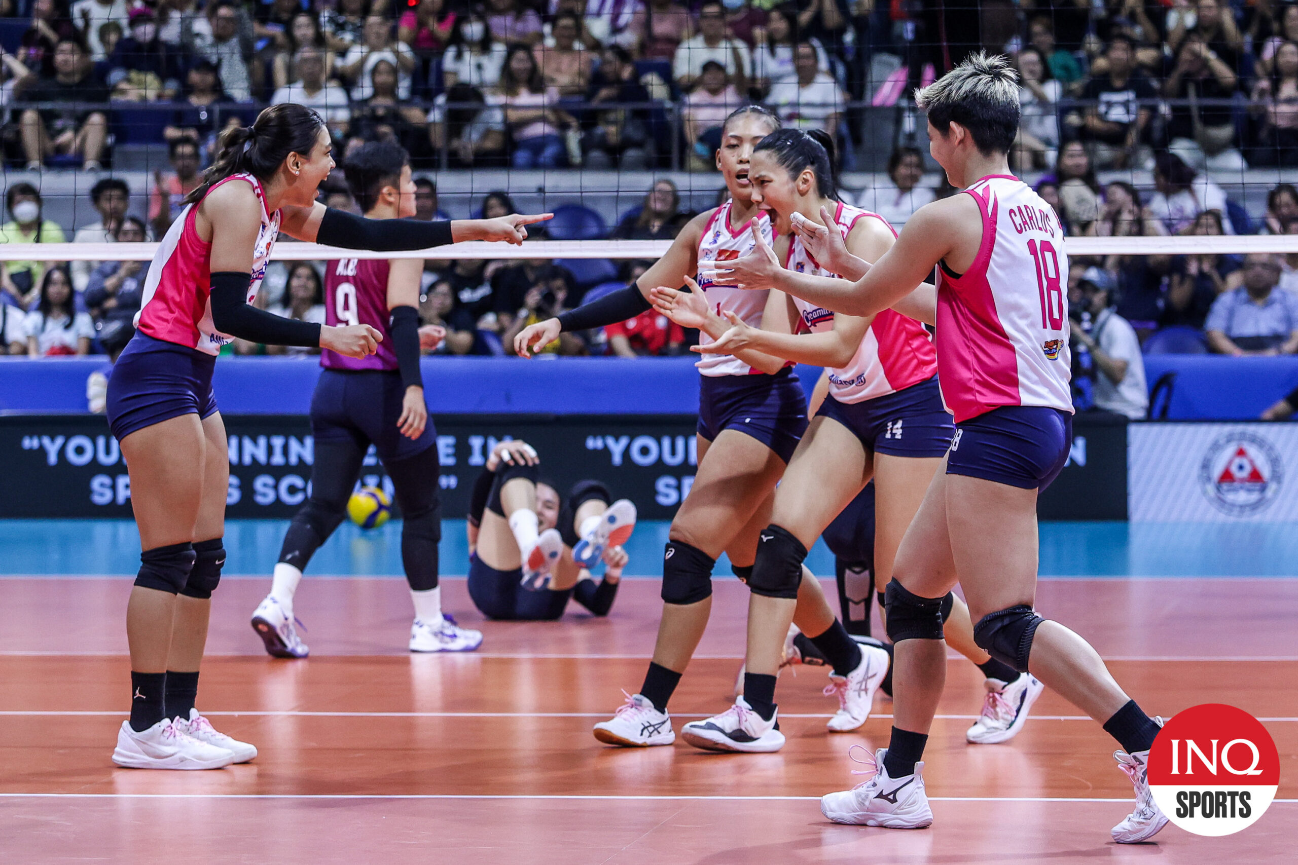 Creamline Cool Smashers celebrate a point against the Choco Mucho Flying Titans in the PVL All-Filipino Conference