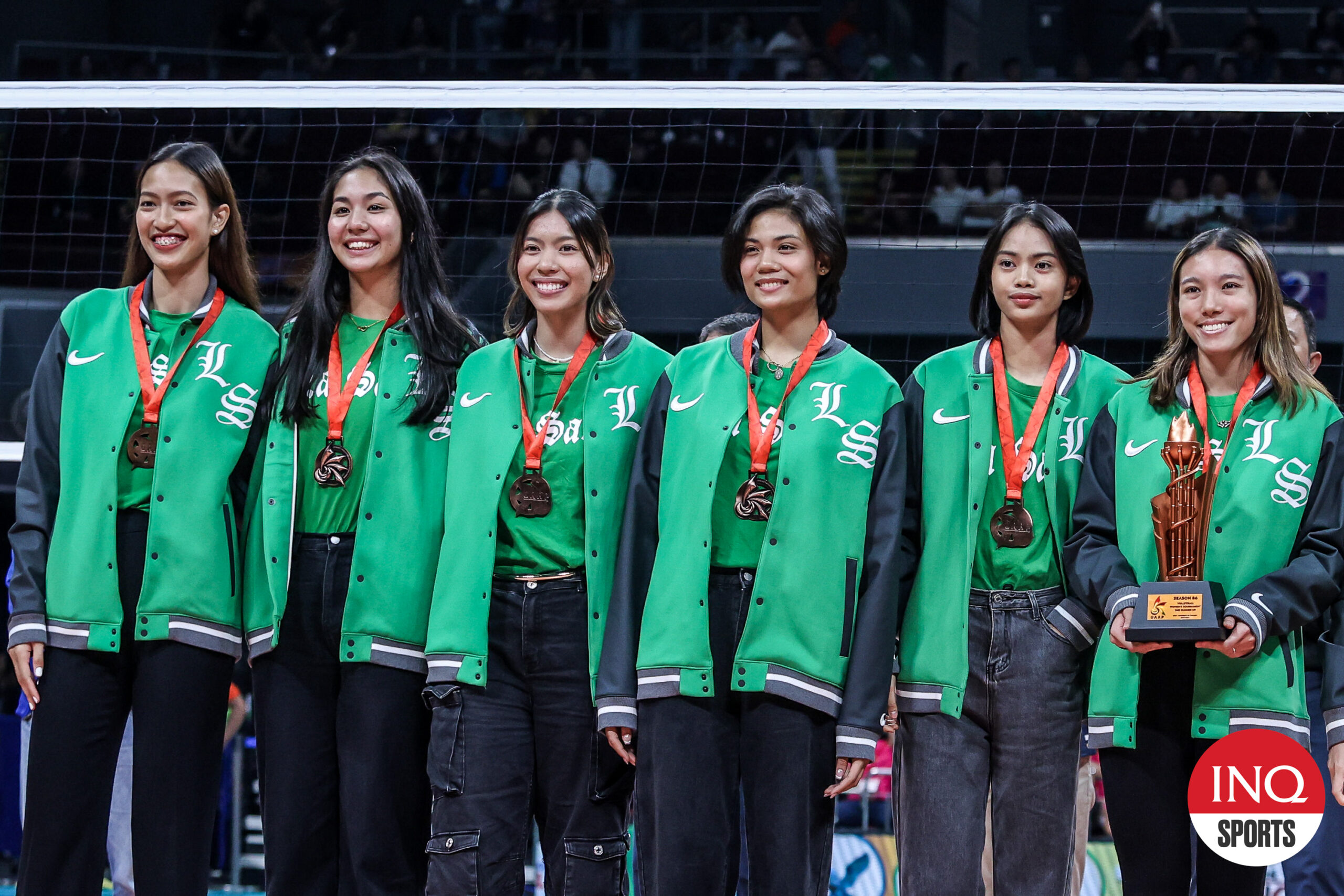 La Salle’s Julia Coronel and Thea Gagate after receiving the Lady Archers' bronze medal in the UAAP Season 86 women's volleyball tournament