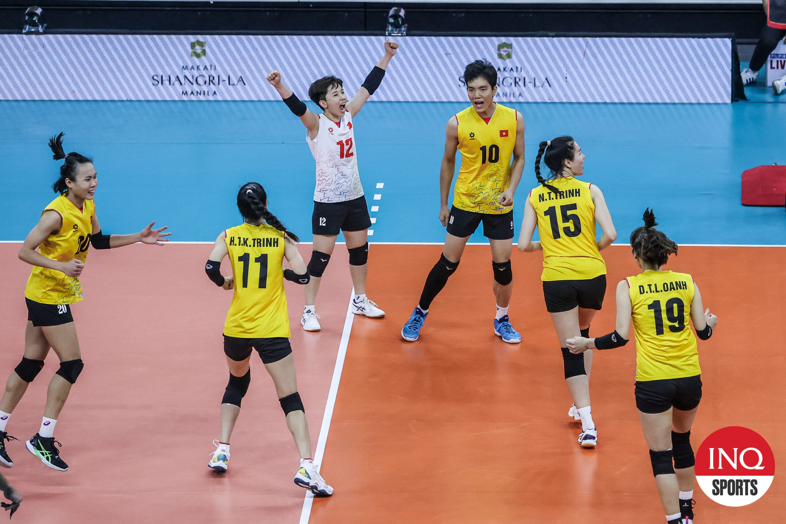 Vietnam celebrates a point against Kazakhstan in their AVC Challenge Cup 2024 gold medal match.