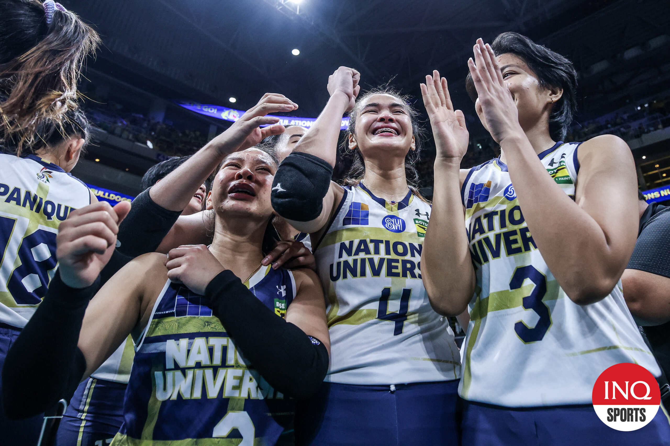 Bella Belen and the NU Lady Bulldogs after winning the UAAP Season 86 women's volleyball championship with a sweep of UST Tigresse
