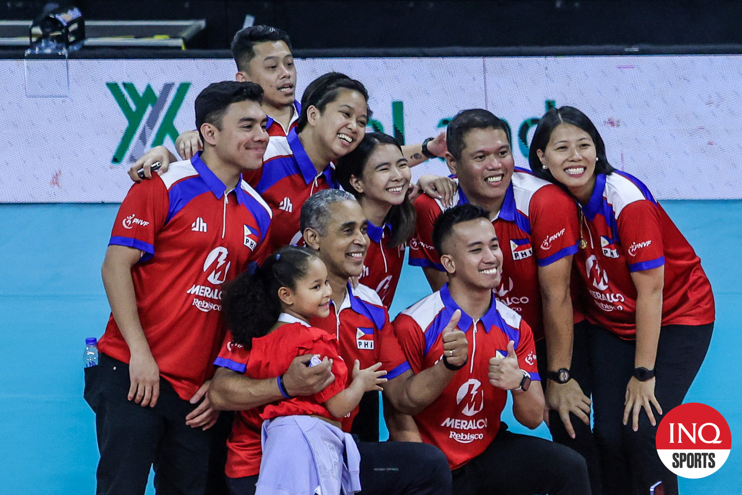 Alas Pilipinas coach  Jorge Souza de Brito with the coaching staff after the bronze medal game