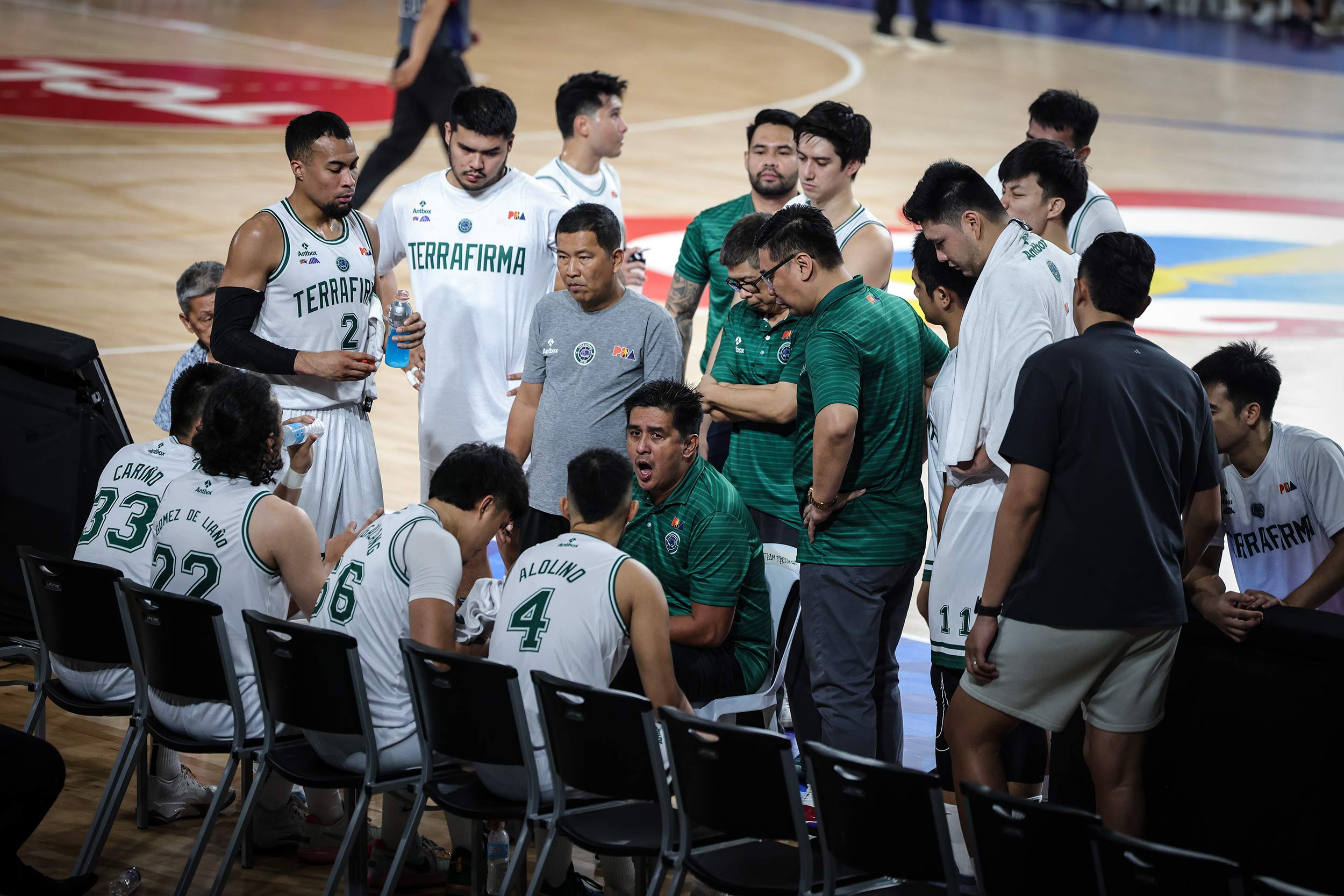 The Terrafirma Dyip in a huddle during a PBA Philippine Cup game