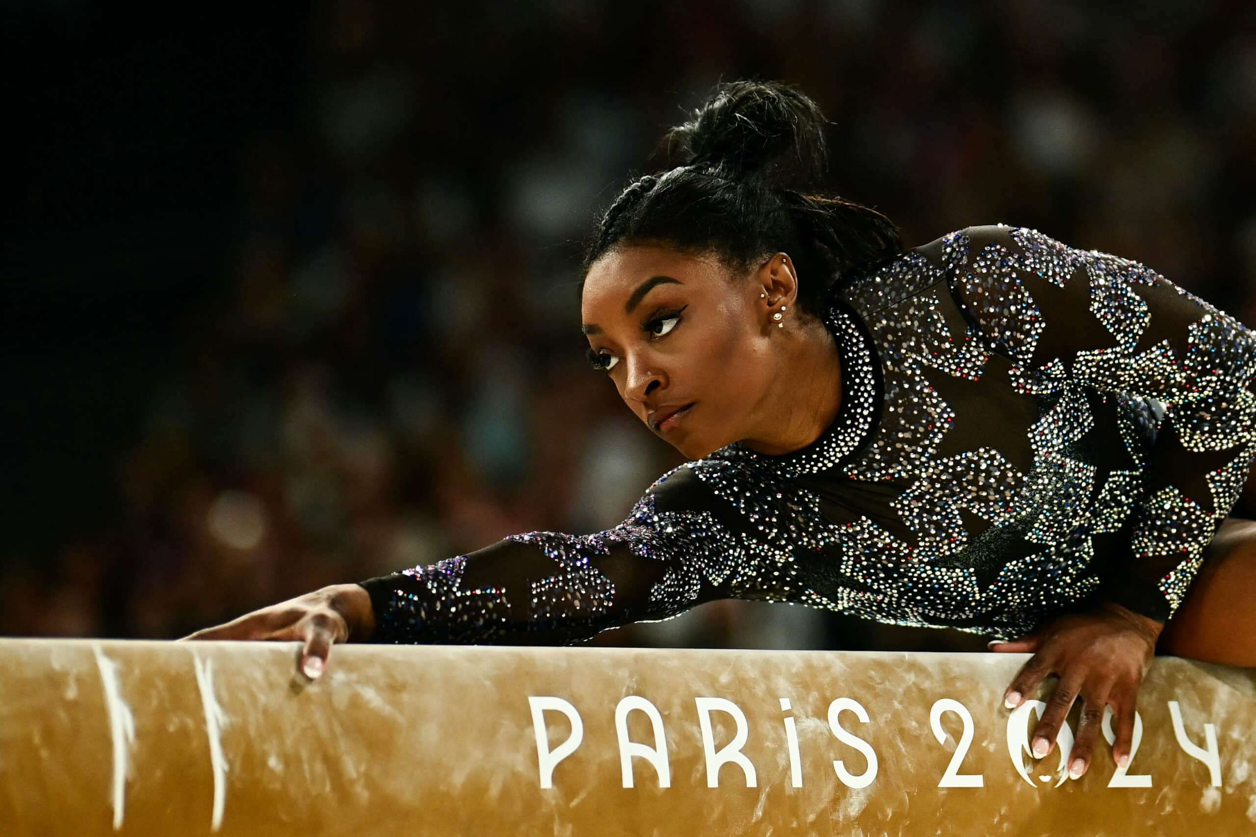 Simone Biles dazzles in Paris Olympics debut despite injury scare ...