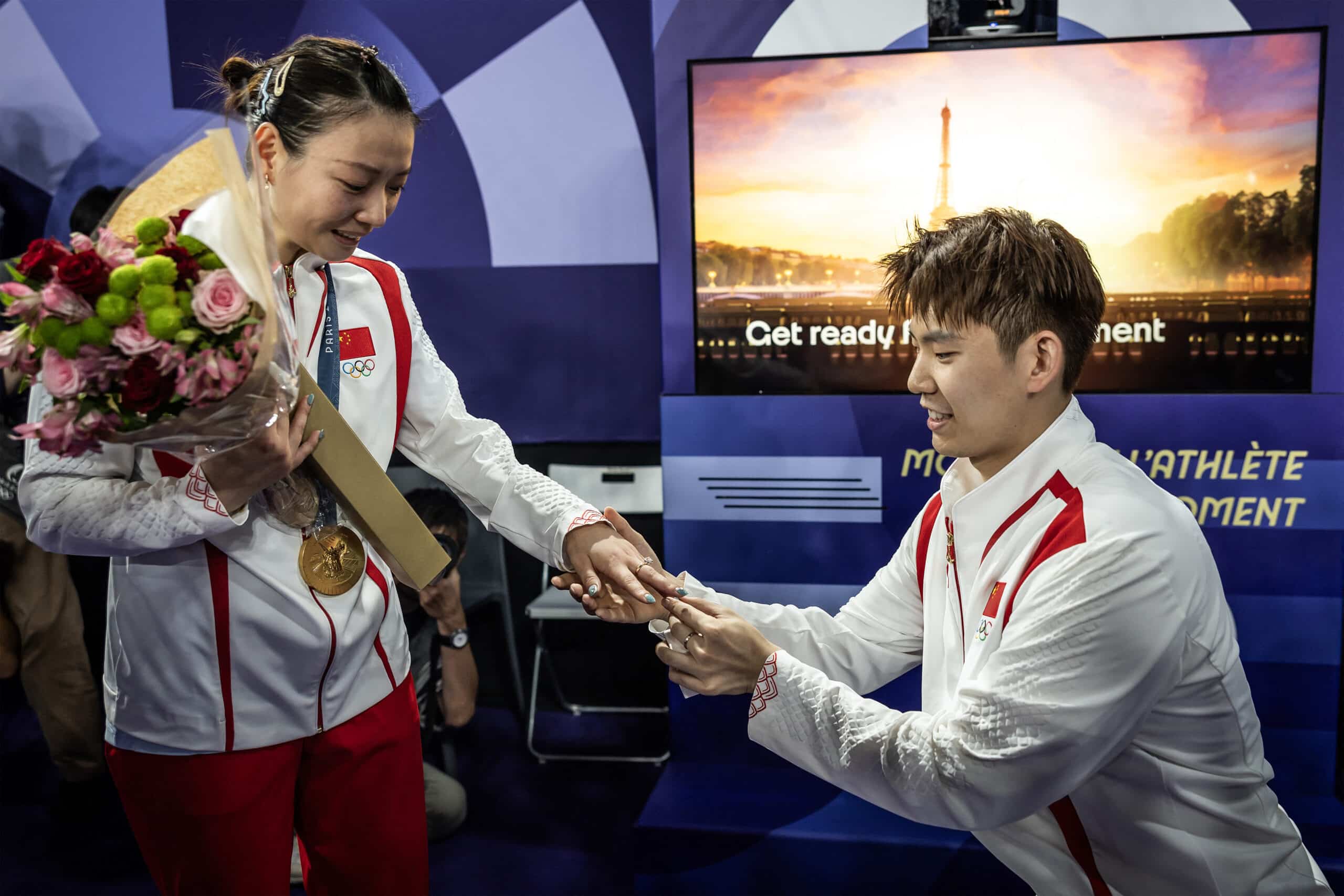 Player wins badminton gold, gets engagement ring