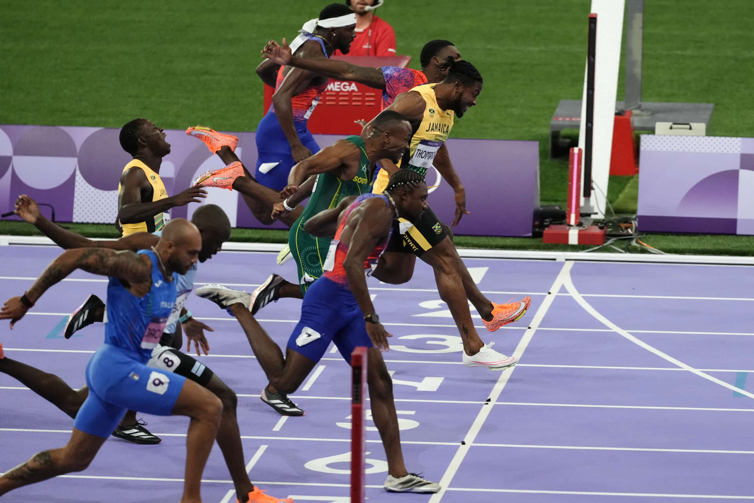 Noah Lyles wins Olympic 100m gold in closest finish in modern history