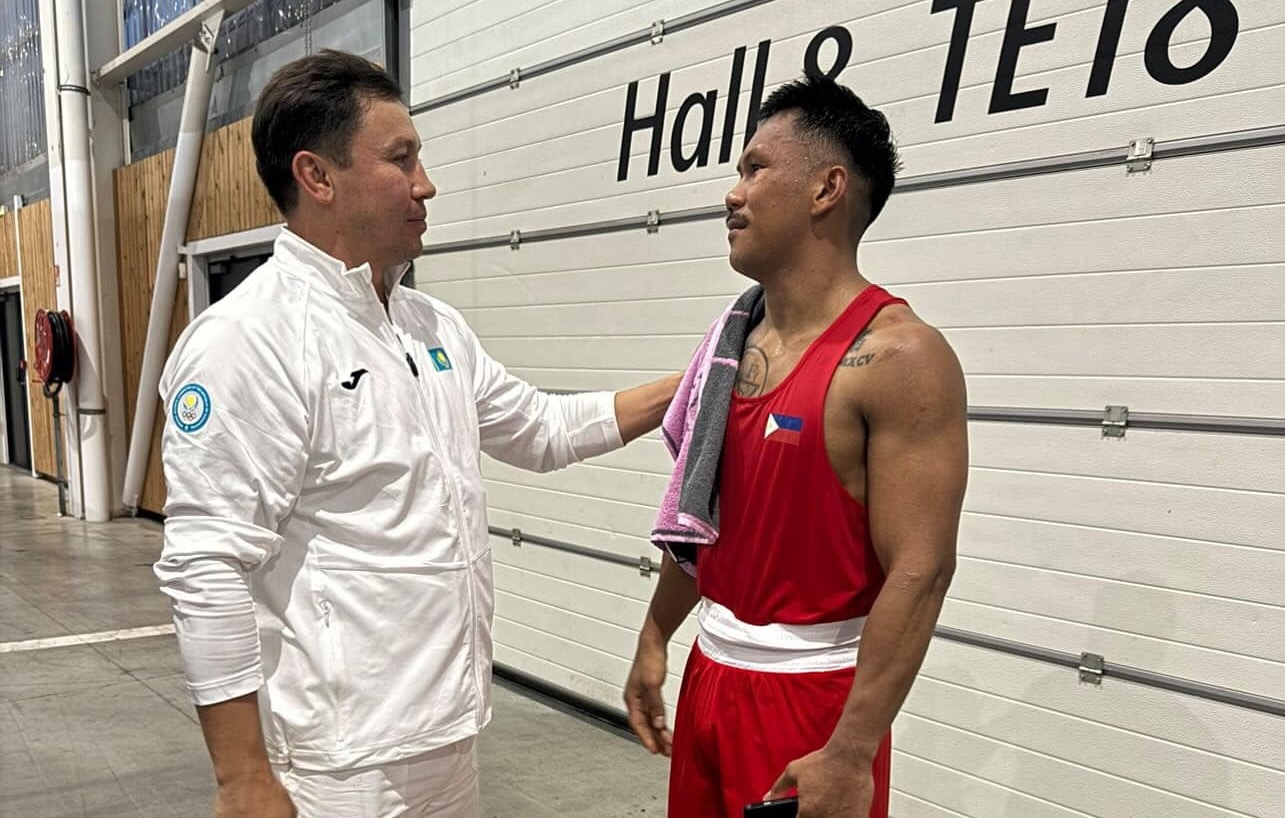 Team Philippines' Eumir Marcial speaks with pro boxer Gennady Golovkin after his opening bout in the Paris Olympics 2024.