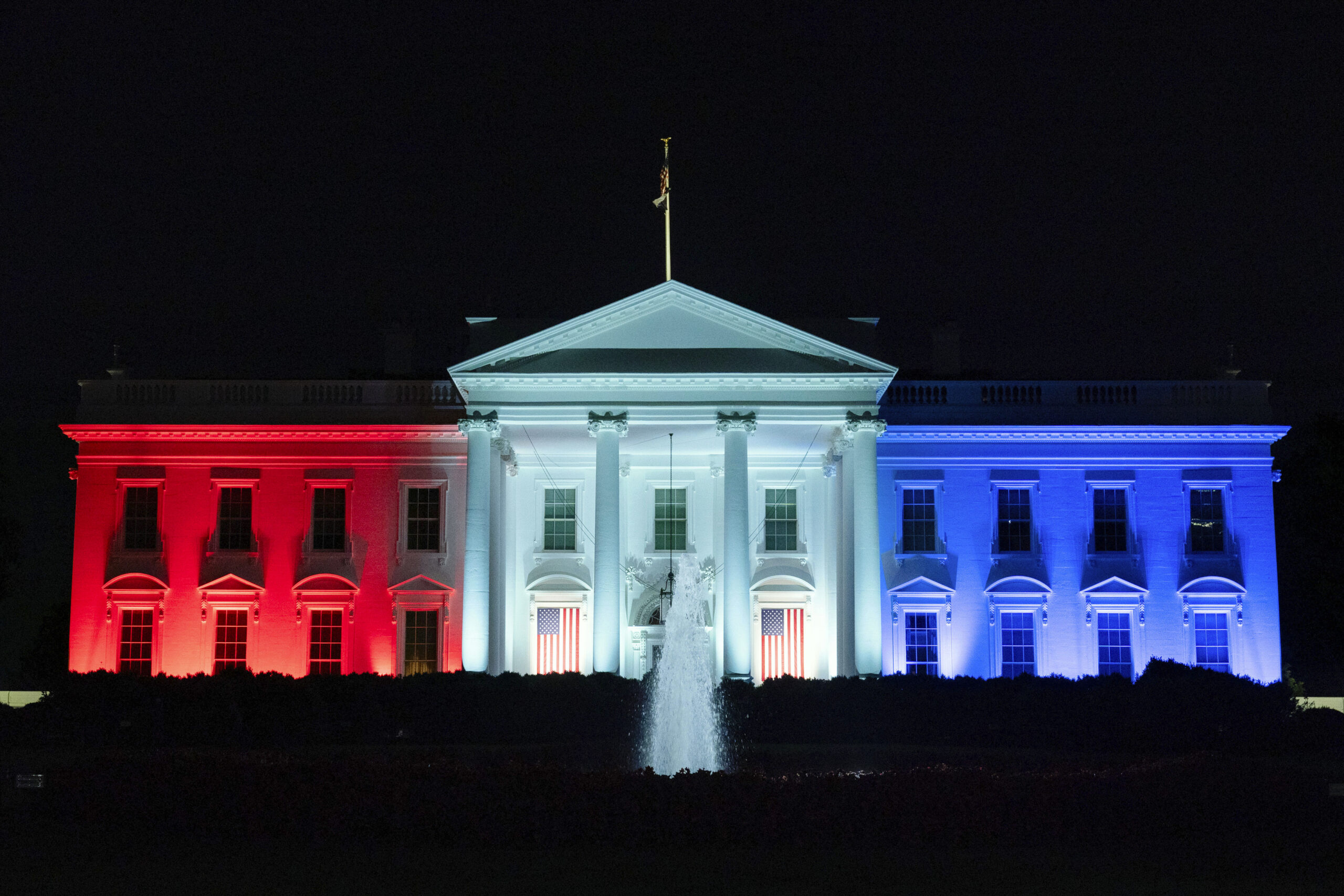 The White House is lit with the colors of the American flag to support team USA competing in the Paris Olympics, on Monday, July 29, 2024,