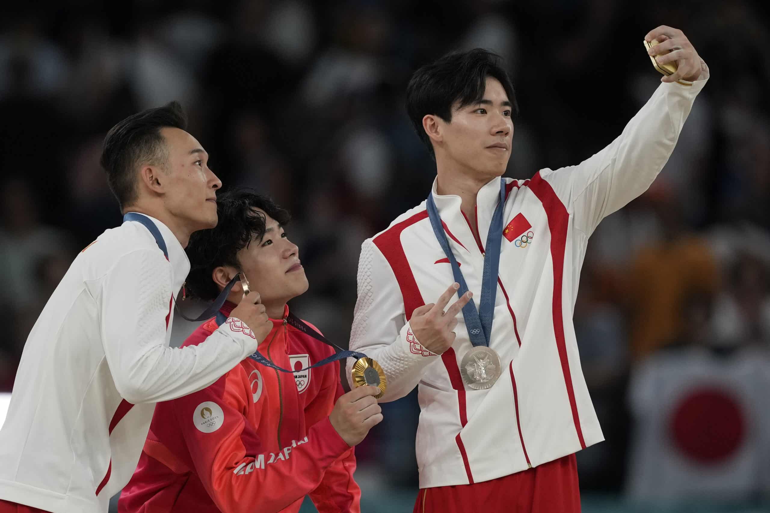 Shinnosuke Oka Japan Paris Olympics 2024 gymnastics men's all-around title Zhang Boheng,