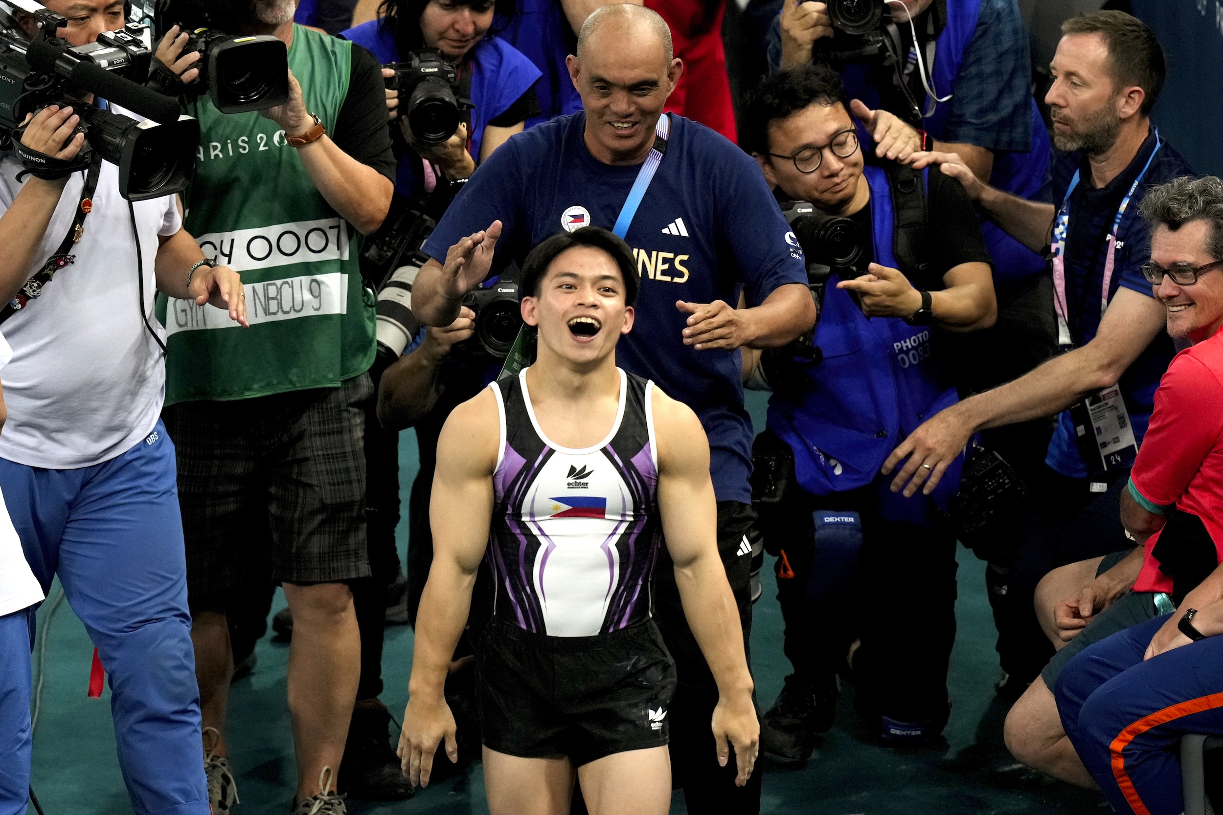 Carlos Yulo (photo above) will stick to the same path that led him to Olympic glory. —AP . 