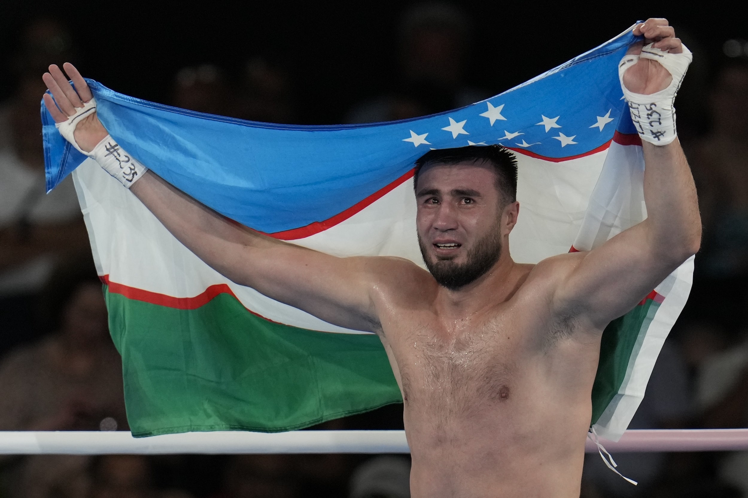 After coach’s life was saved, Uzbekistan dominates Olympic boxing