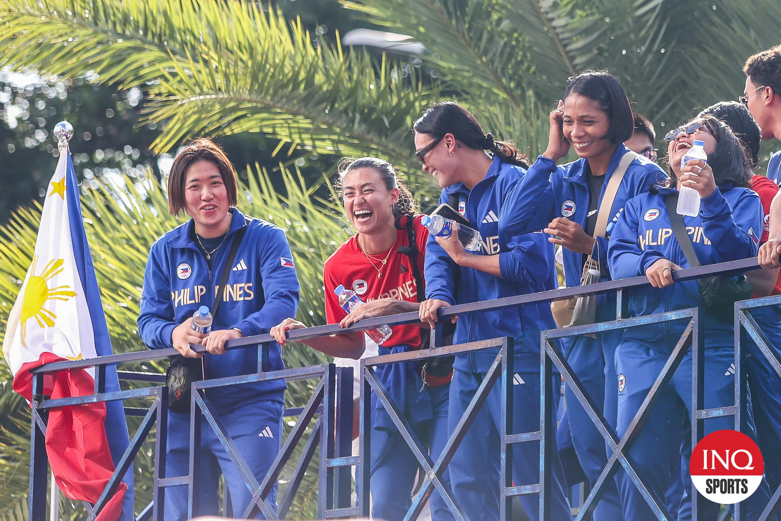 Team Philippines' hurdles Lauren Hoffman (second from left) during the Heroes parade for the Filipino athletes after the Paris Olympics