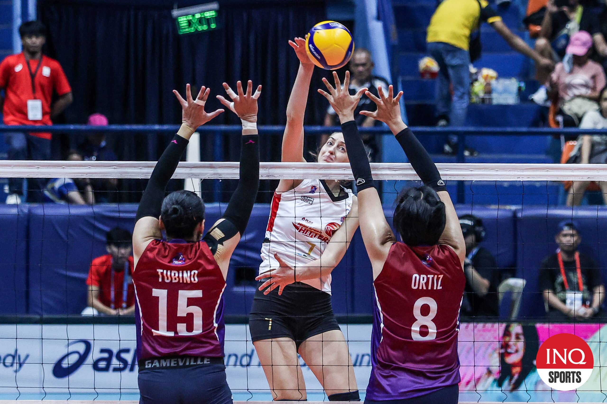 PLDT High Speed Hitters' Elena Samoilenko rising for a hit against Choco Mucho defenders in the PVL Reinforced Conference.