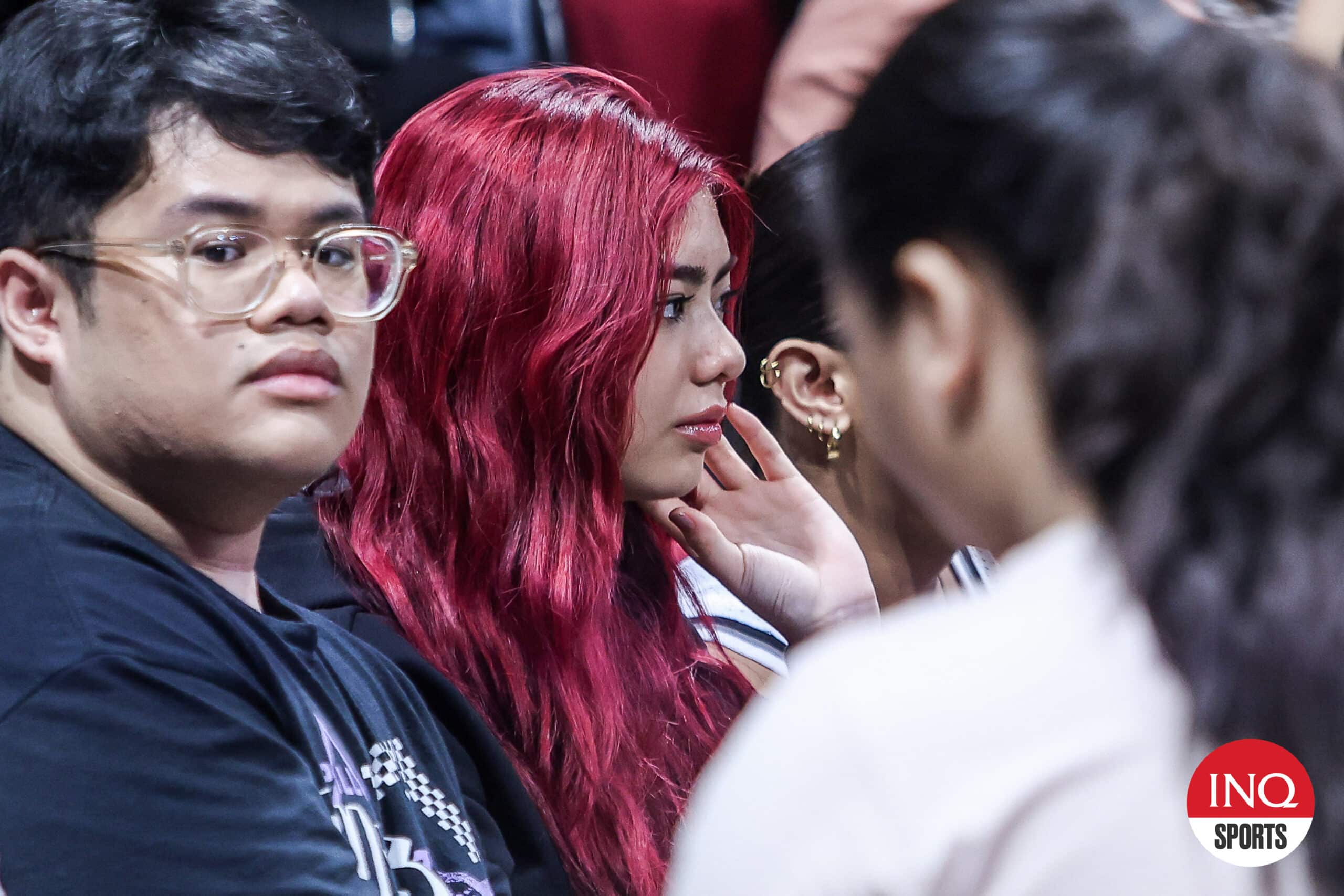 BINI member Mikha Lim watching the PVL semifinals between Akari Chargers and PLDT High Speed Hitters.