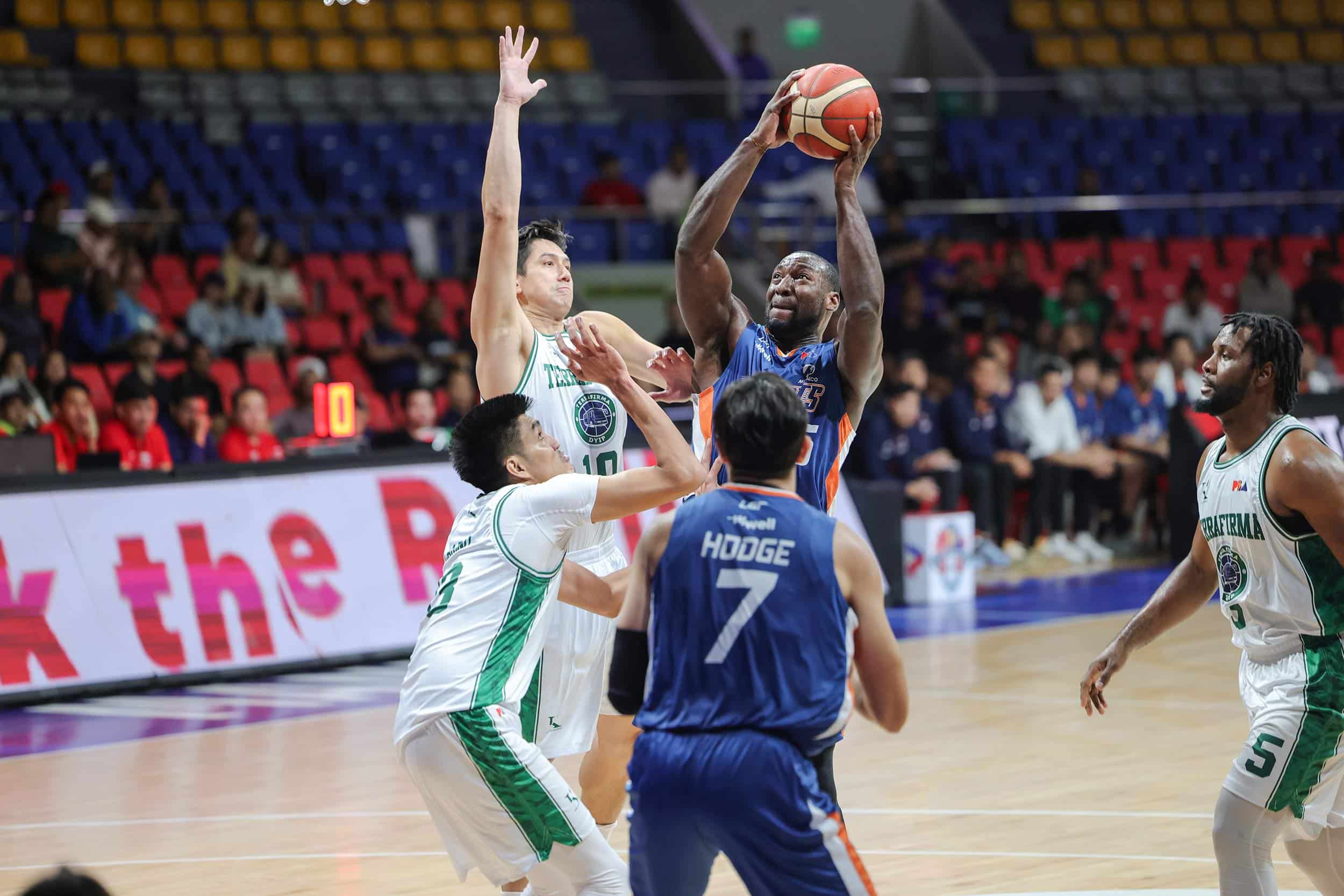 Meralco Bolts' Allen Durham against Terrafirma defenders in the PBA Governors' Cup. 