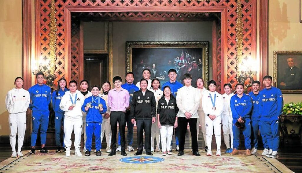 President Marcos, first lady Liza Araneta-Marcos and their children receive Filipino Olympians, led by double gold winner Carlos Yulo, at Malacañang on Tuesday night where they were given honors following their participation in the 2024 Paris Olympics. The President makes time to greet Yulo, who made history for his two gold medals in gymnastics events, during the Palace reception.