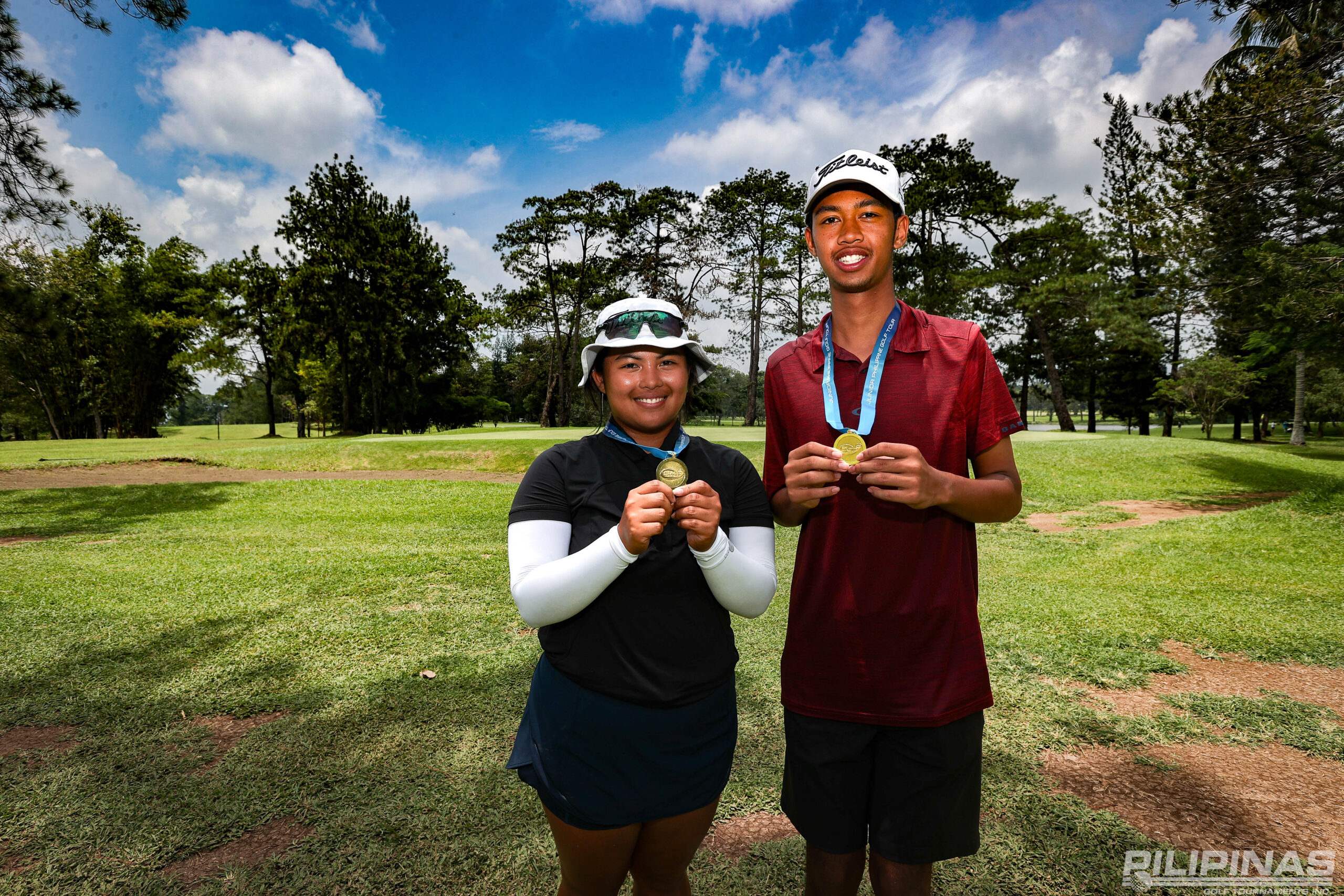 Cliff Nuneza and Ally Gaccion display their medals after ruling the 16-18 division of the ICTSI JPGT Mindanao Series 3 in contrasting fashion.