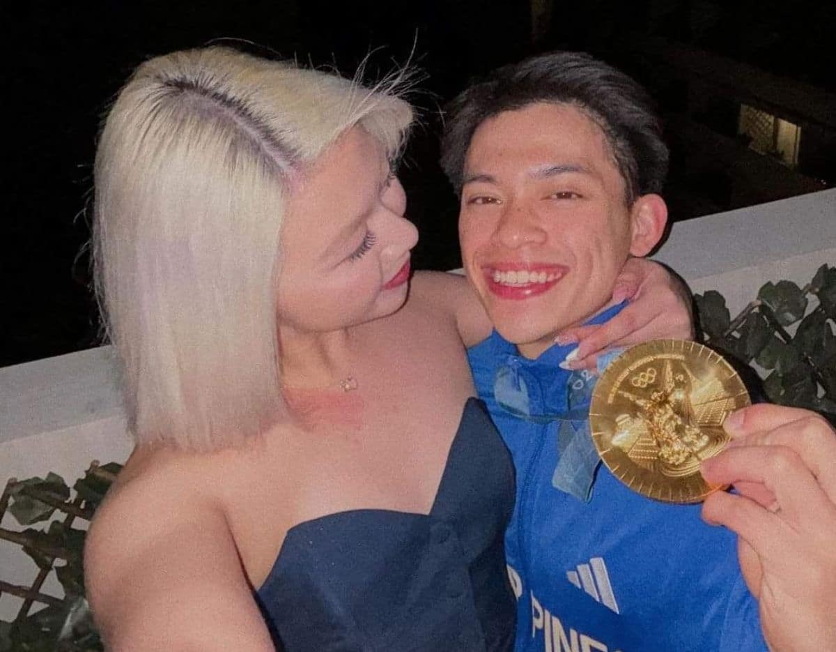 Carlos Yulo celebrates Paris Olympics gold with girlfriend