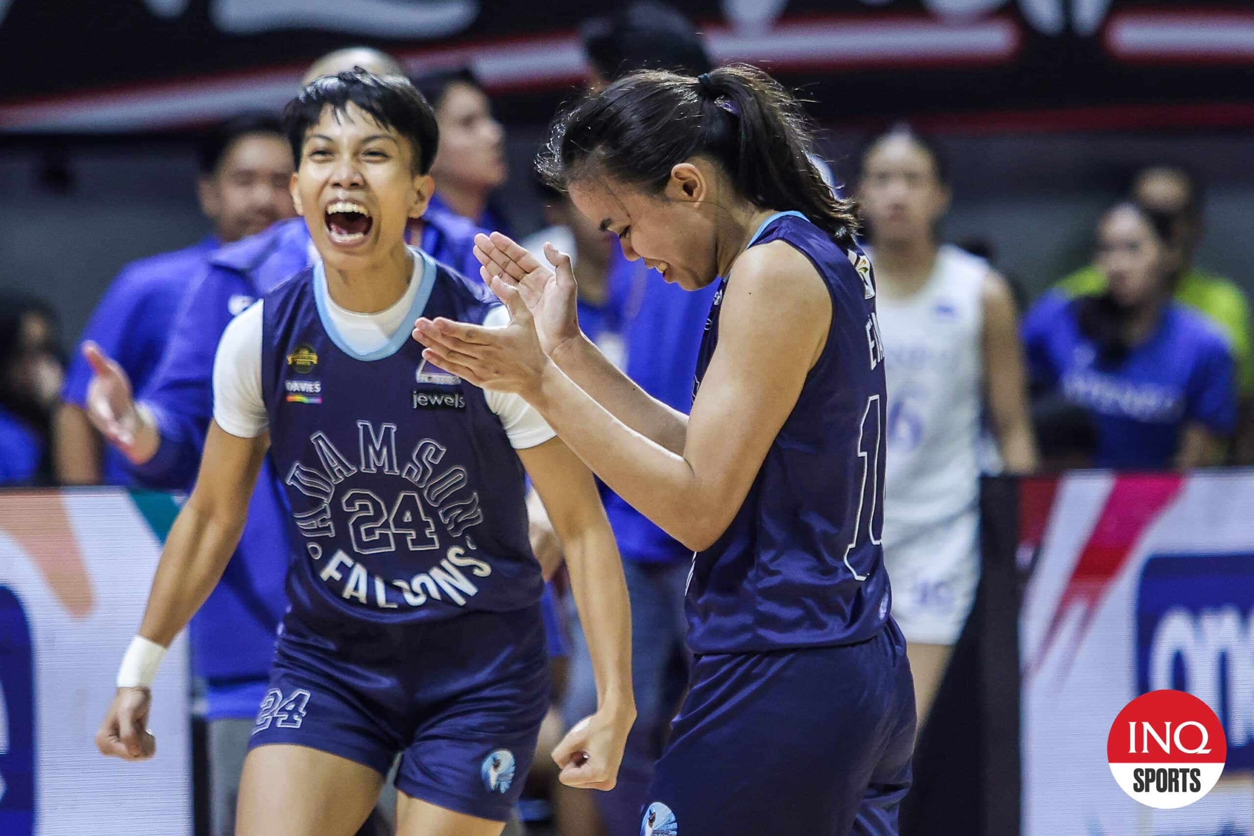 Adamson Lady Falcons' Elaine Etang celebrate with her team during a UAAP Season 87 women's basketball game.