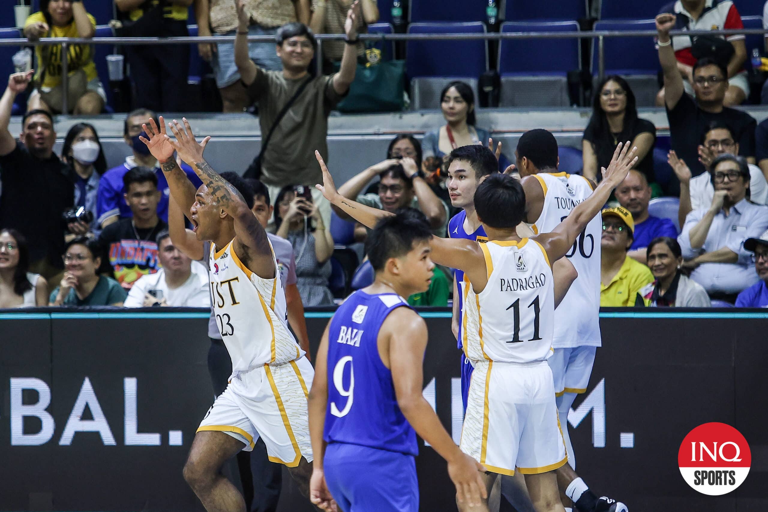 UST Growling Tigers react after being Ateneo Blue Eagles in the UAAP Season 87 men's basketball tournament.