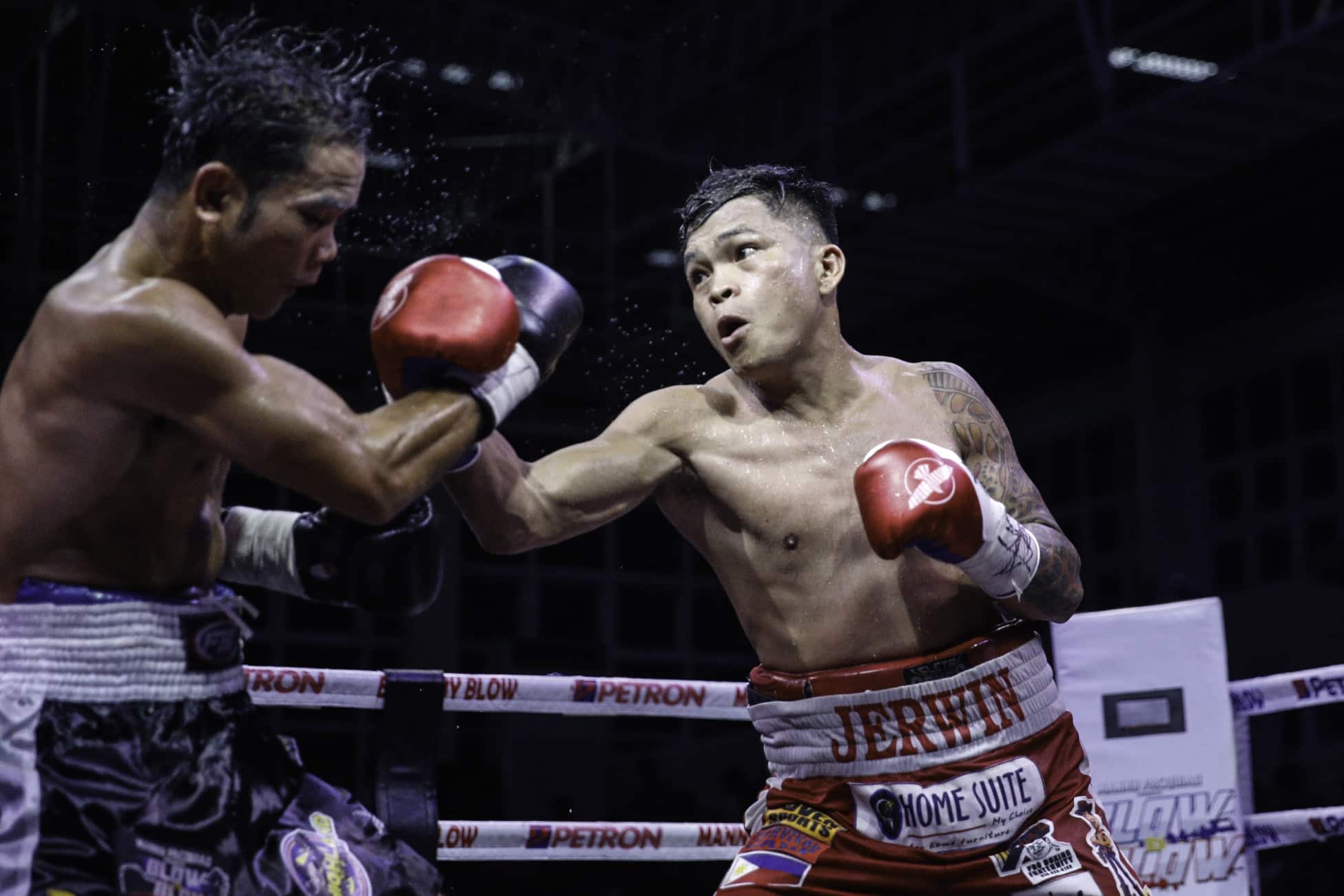 Jerwin Ancajas throws a punch against Thai opponent Sukpraserd Ponpitak Manny Pacquiao’s Blow-by-Blow. 