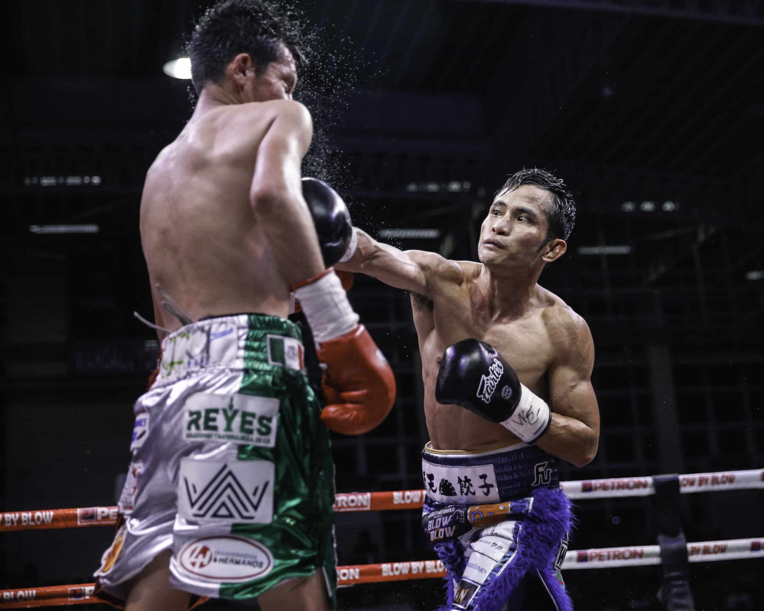 Melvin Jerusalem against Mexican defender Luis Angel Castillo during their WBC minimumweight title fight