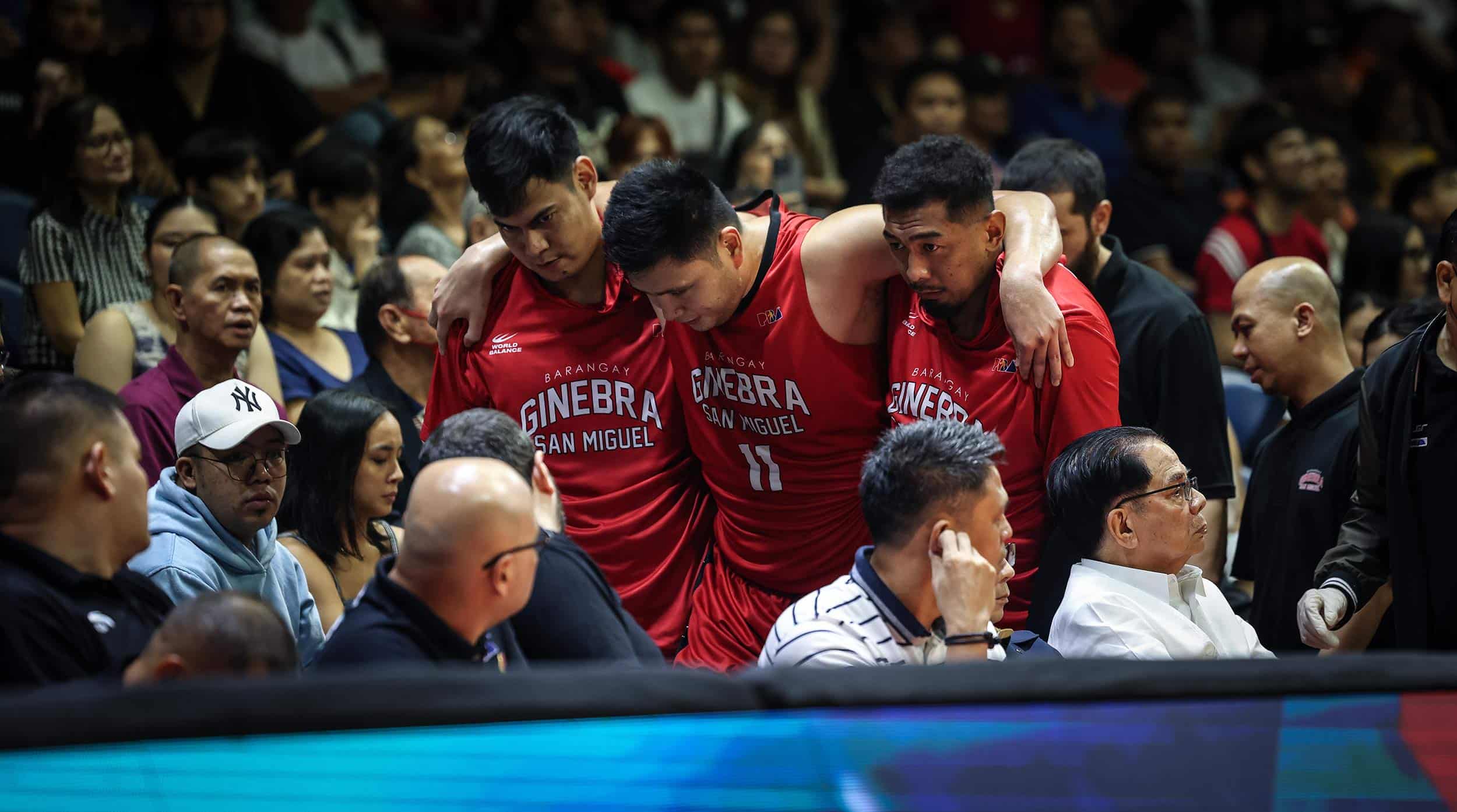 Ginebra Gin Kings' Isaac Go helped off to the bench after an injury during a PBA Governors' Cup game. –