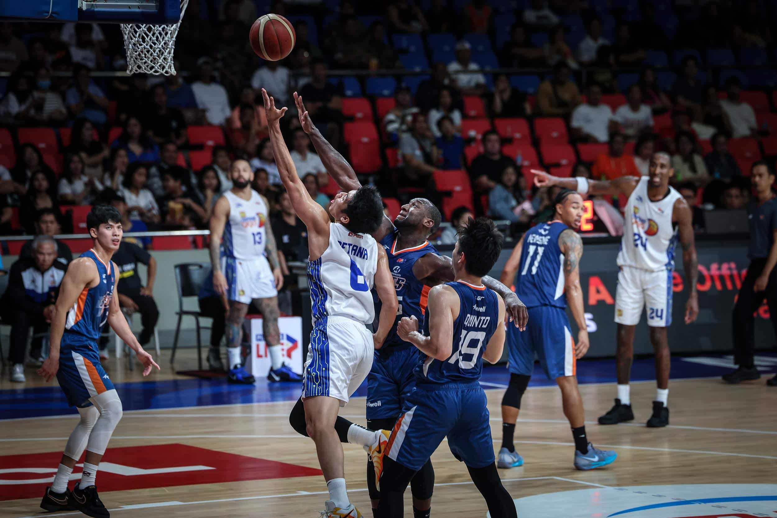 TNT's Calvin Oftana against Meralco's Allen Durham in the PBA Governors' Cup