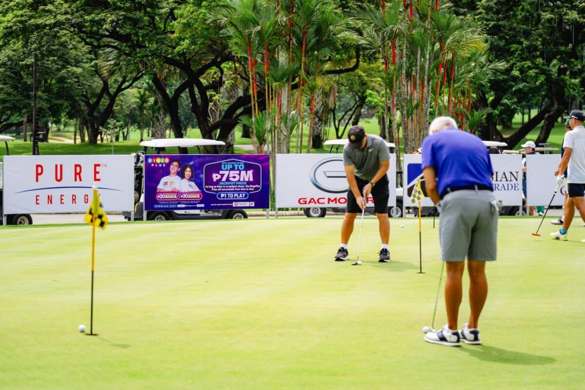 A shot of Annual Macario U. Te. Sr. Memorial Cup golfers playing with the BingoPlus banner in the background.