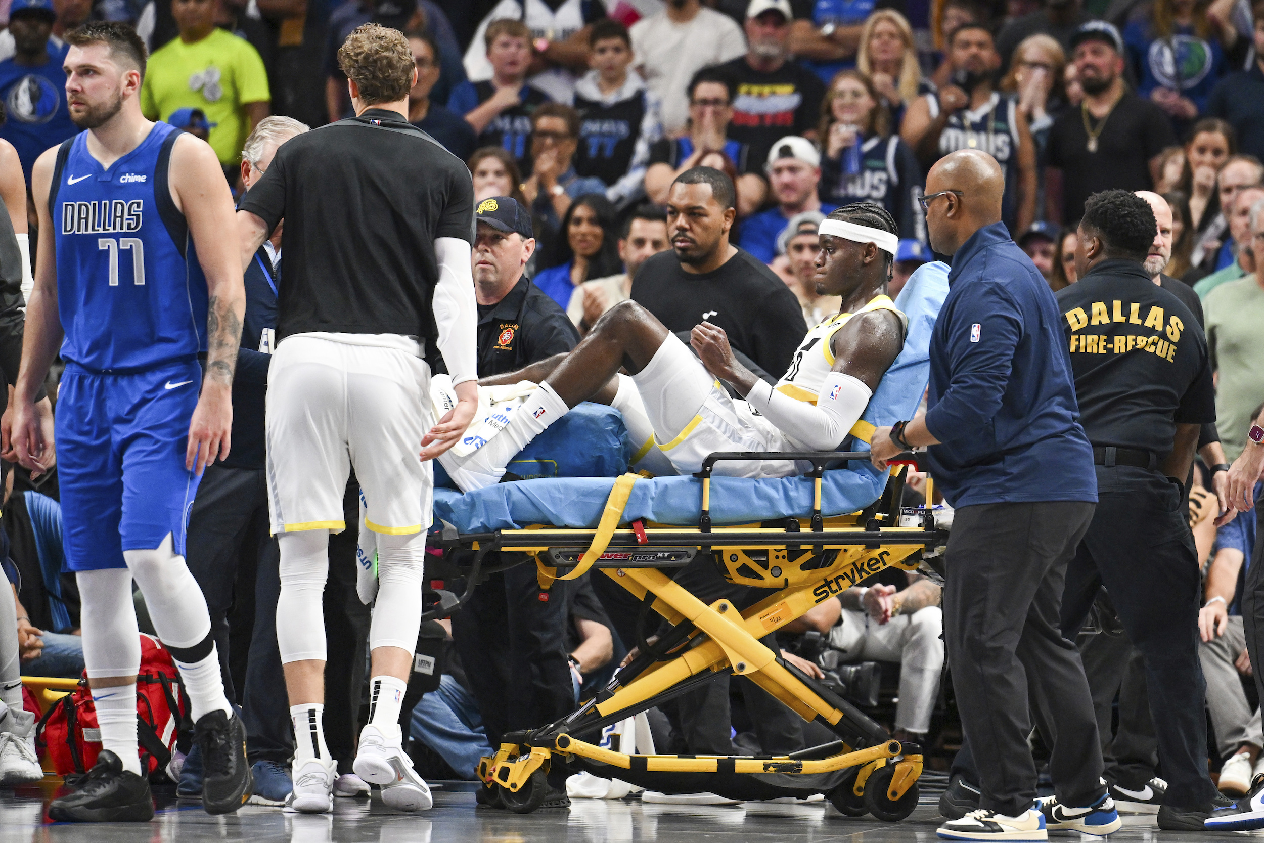 Jazz’s Taylor Hendricks stretchered off after breaking leg