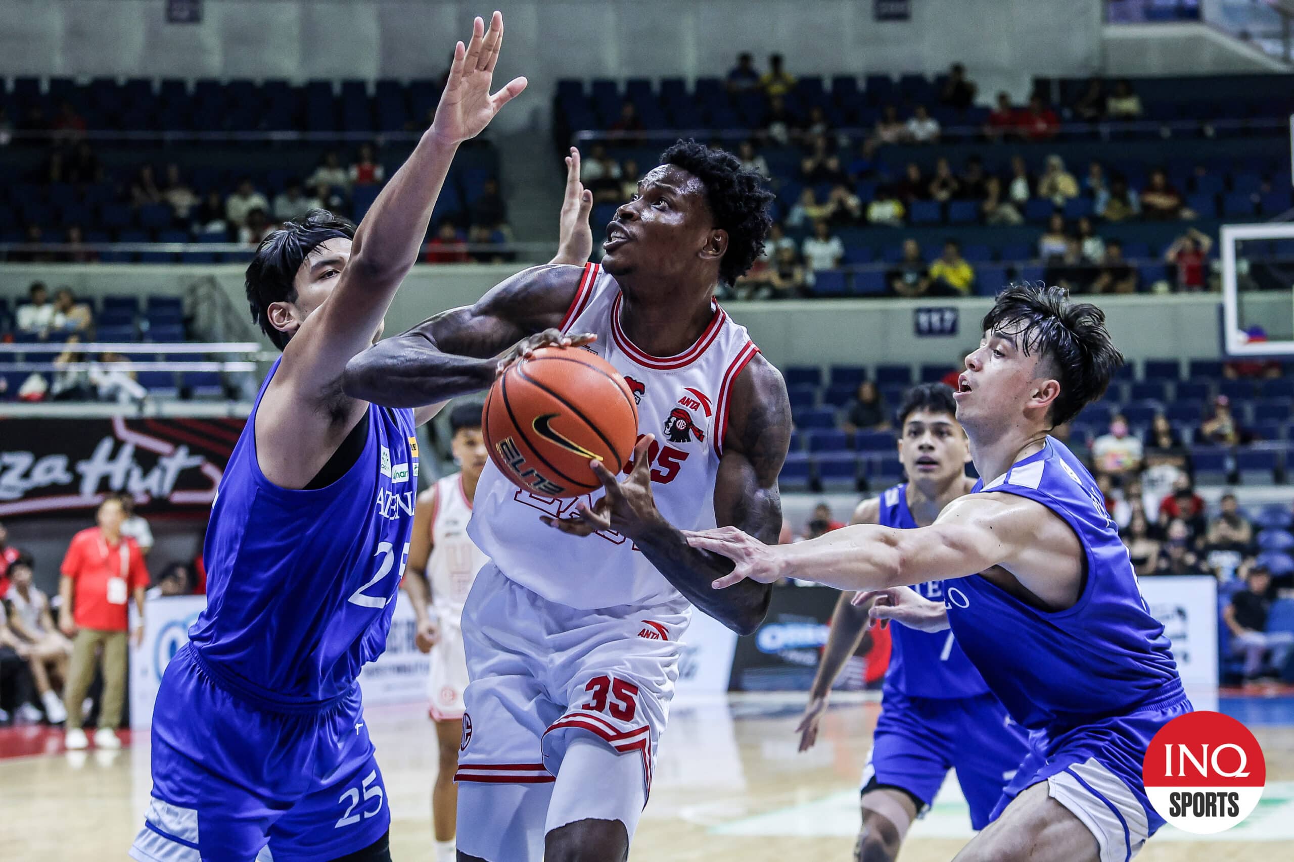 UE Red Warriors' Precious Momowei during a UAAP Season 87 men's basketball game against Ateneo Blue Eagles