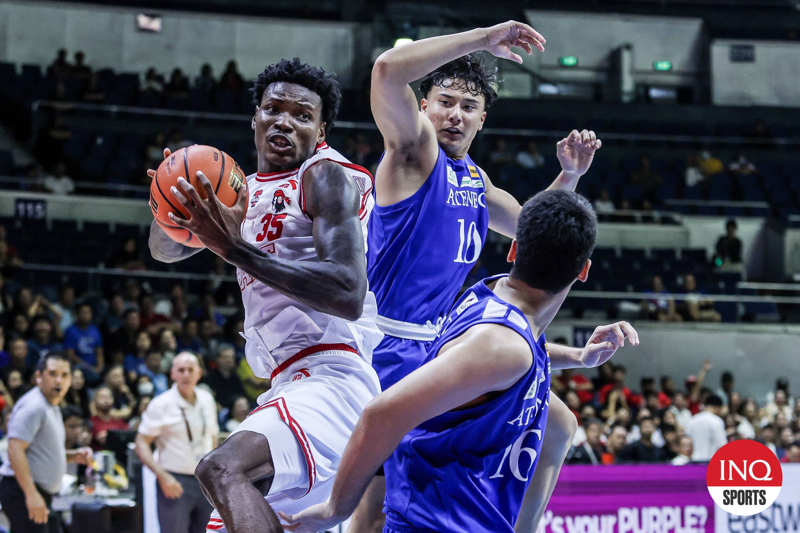 UE Red Warriors' Precious Momowei during a UAAP Season 87 men's basketball game against Ateneo Blue Eagles. 