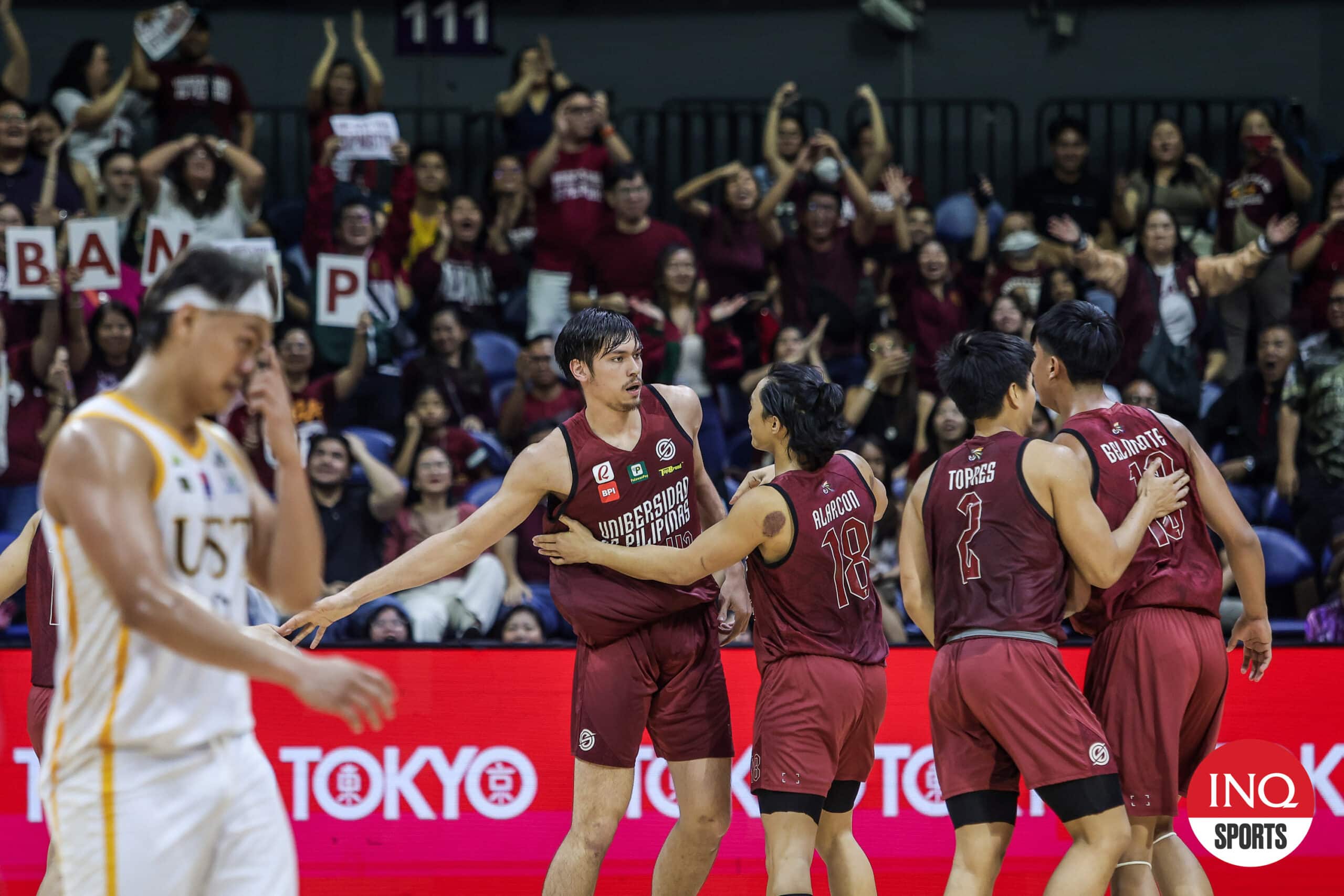 UP Fighting Maroons during a game against UST Growling Tigers in the UAAP Season 87 men's basketball tournament.