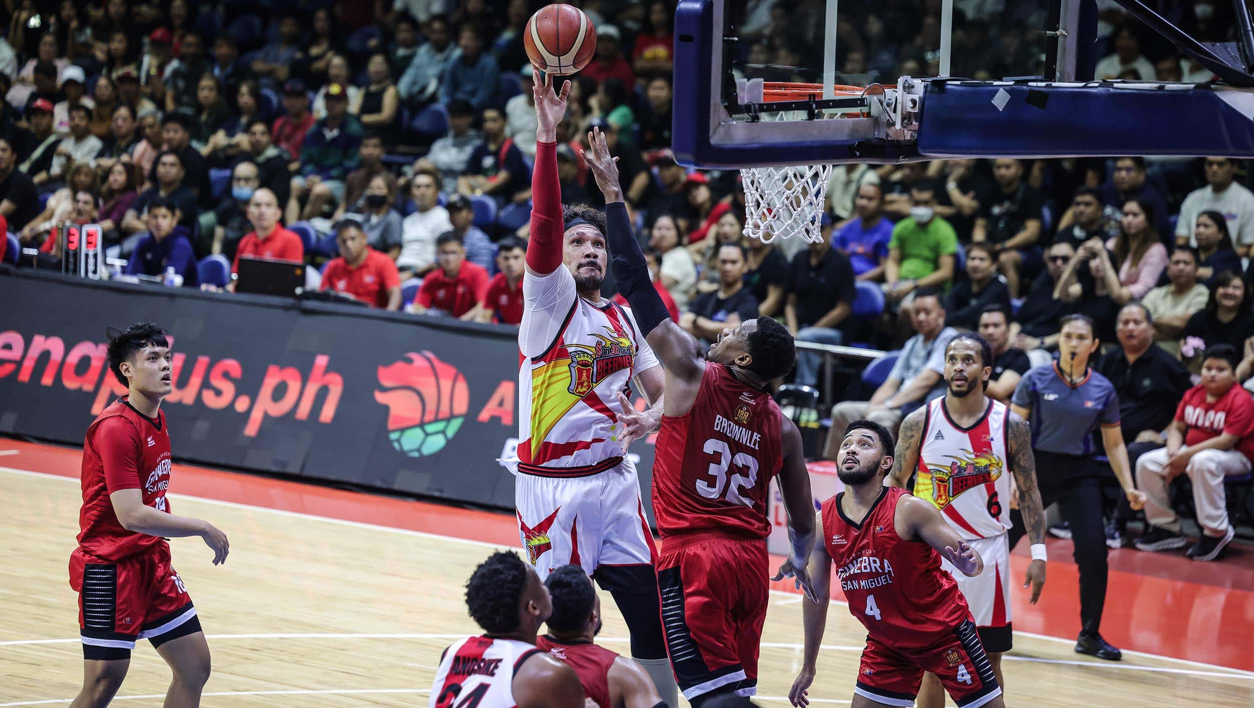 June Mar Fajardo goes up for a shot against Justin Brownlee during the PBA Governors' Cup semifinals game between Barangay Ginebra Gin Kings and San Miguel Beermen.