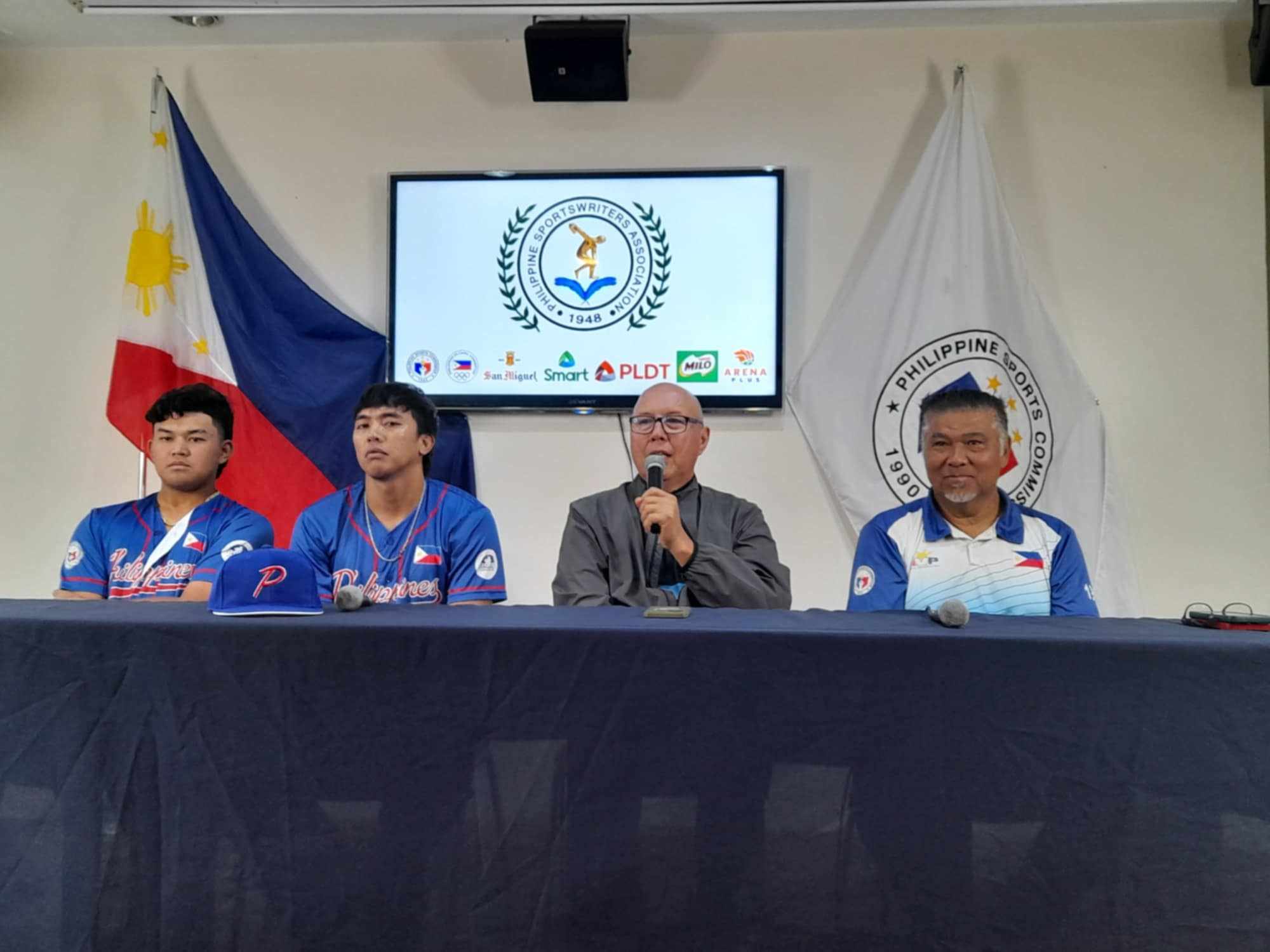 Philippine men's baseball team players Clarence Caasalan, Agon de Vera, PABA chief Chito Loyzaga, and coach Vince Sagisi.