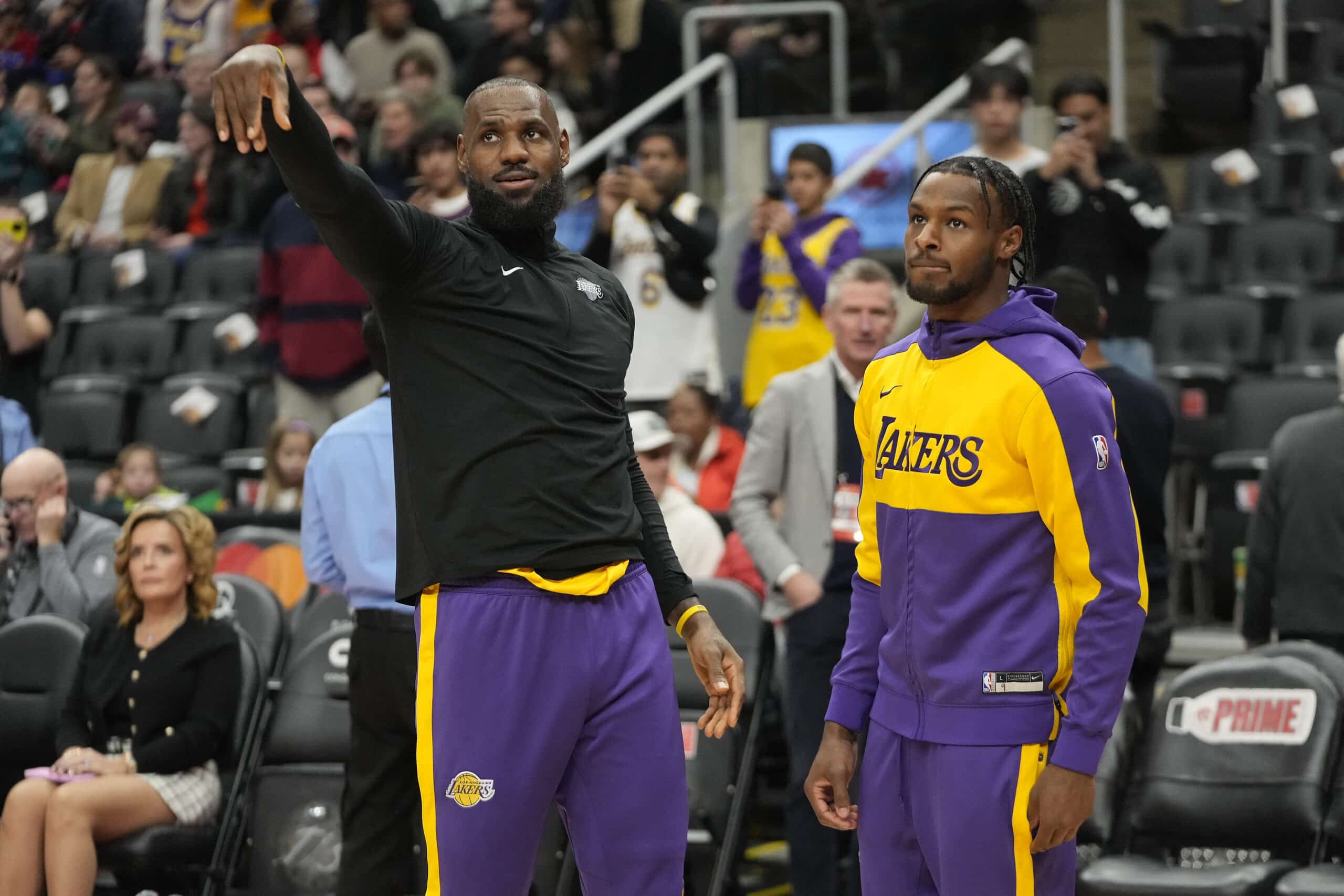 Los Angeles Lakers forward LeBron James (left) and guard Bronny James  NBA