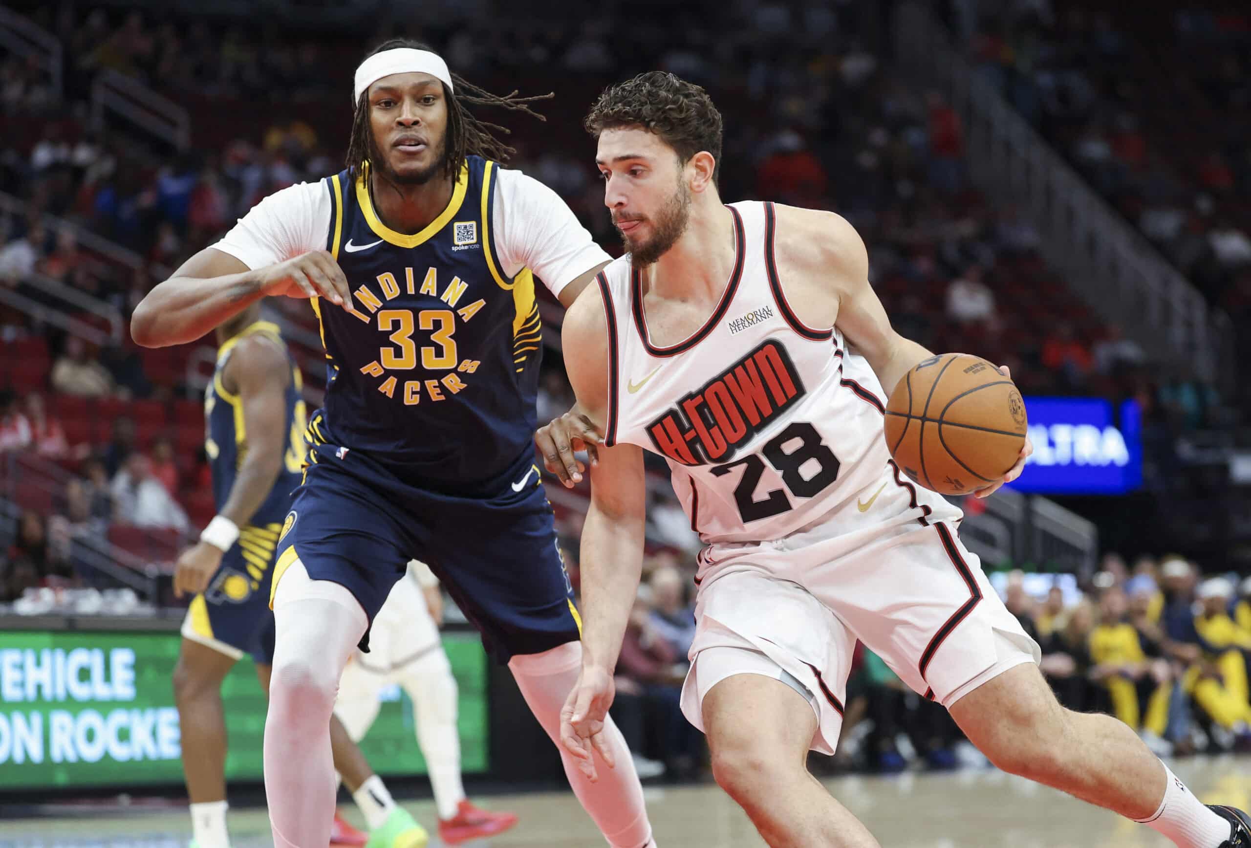 Houston Rockets center Alperen Sengun (28) drives with the ball as Indiana Pacers NBA