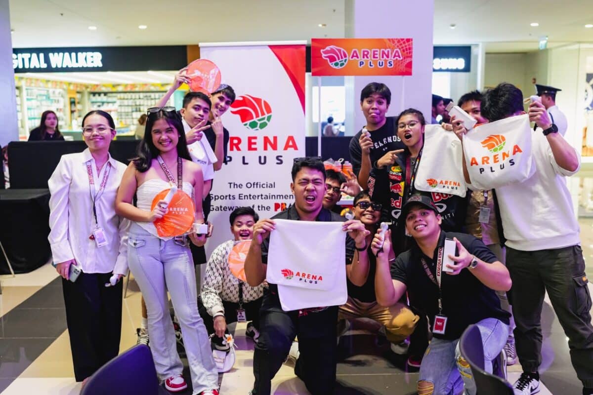 Event goers enjoying ArenaPlus merchandise during the PBA Esports Bakbakan Season 2.