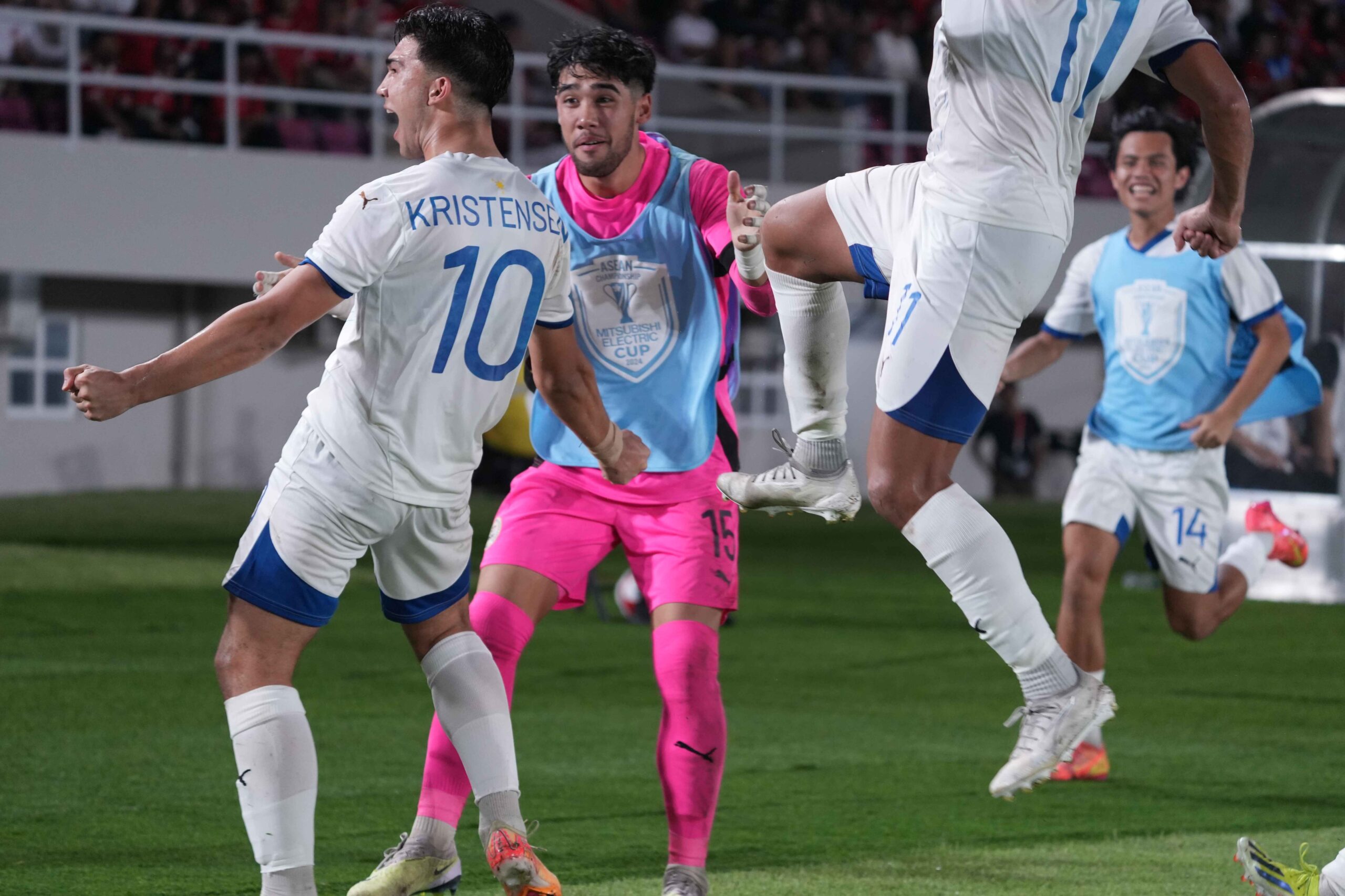 Bjorn Kristensen celebrates a late goal that sent the Philippines into the semifinals of the Asean Mitsubishi Electric Cup.