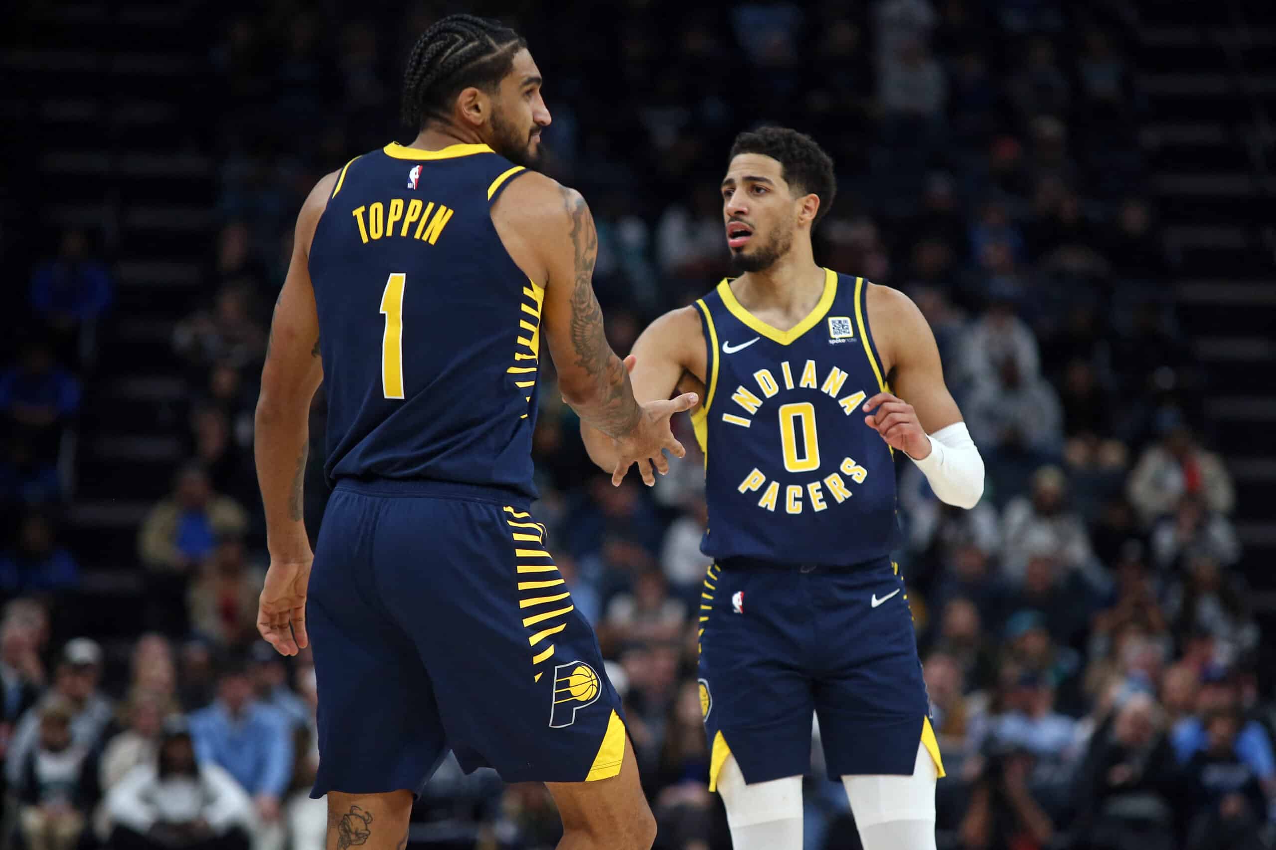 Indiana Pacers forward Obi Toppin (1) reacts with guard Tyrese Haliburton NBA