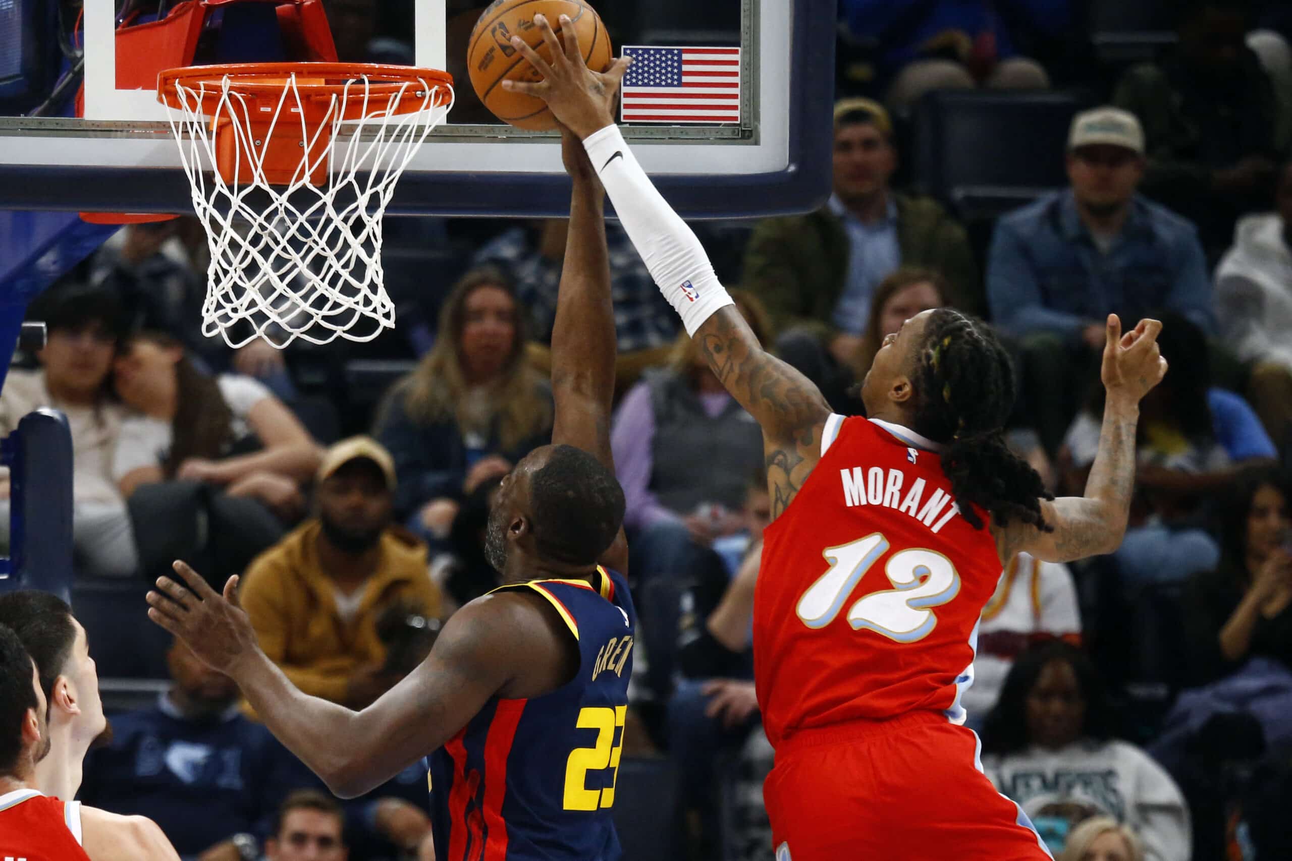 Memphis Grizzlies guard Ja Morant (12) blocks the shot attempt by Golden State Warriors forward Draymond Green  NBA