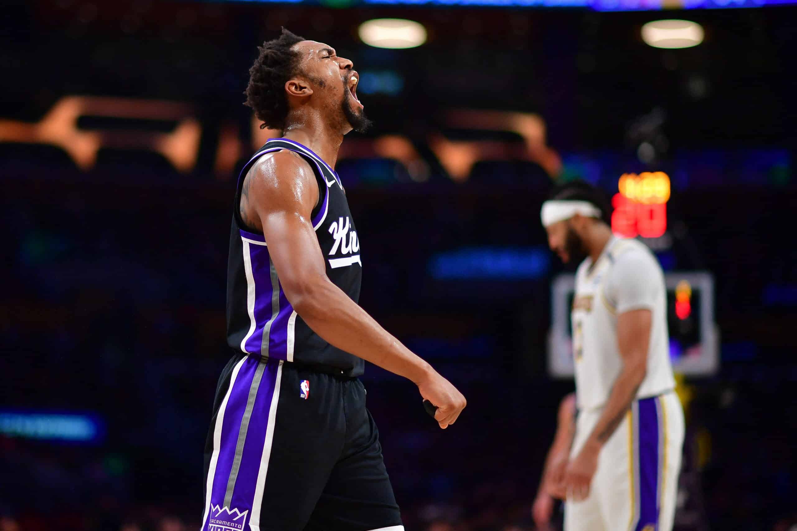 Sacramento Kings guard Malik Monk (0) reacts after drawing a foul against the Los Angeles Lakers  NBA