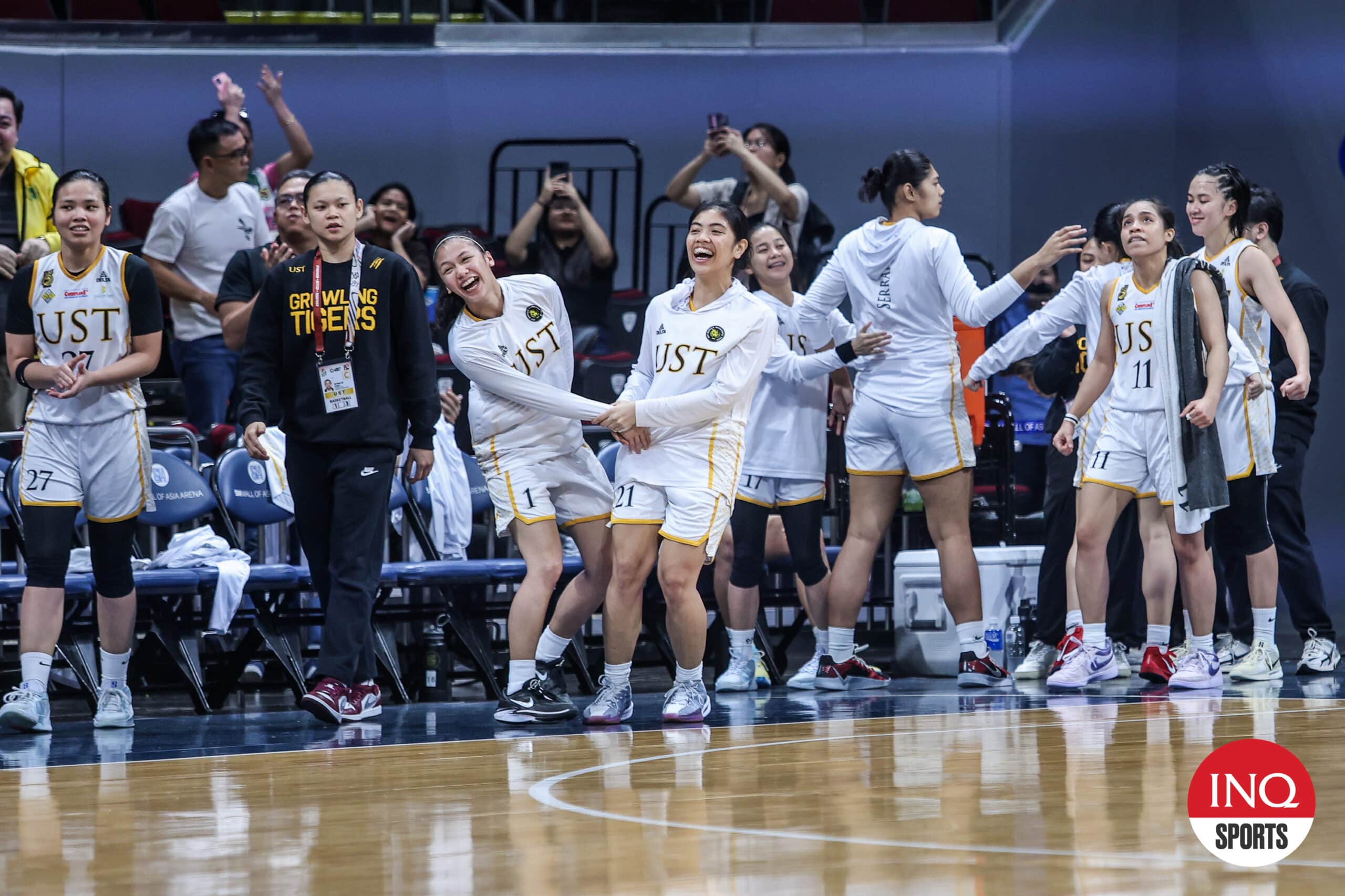 UST Growling Tigresses celebrate a win over Adamson Falcons in the UAAP Season 87 men's stepladder semifinals