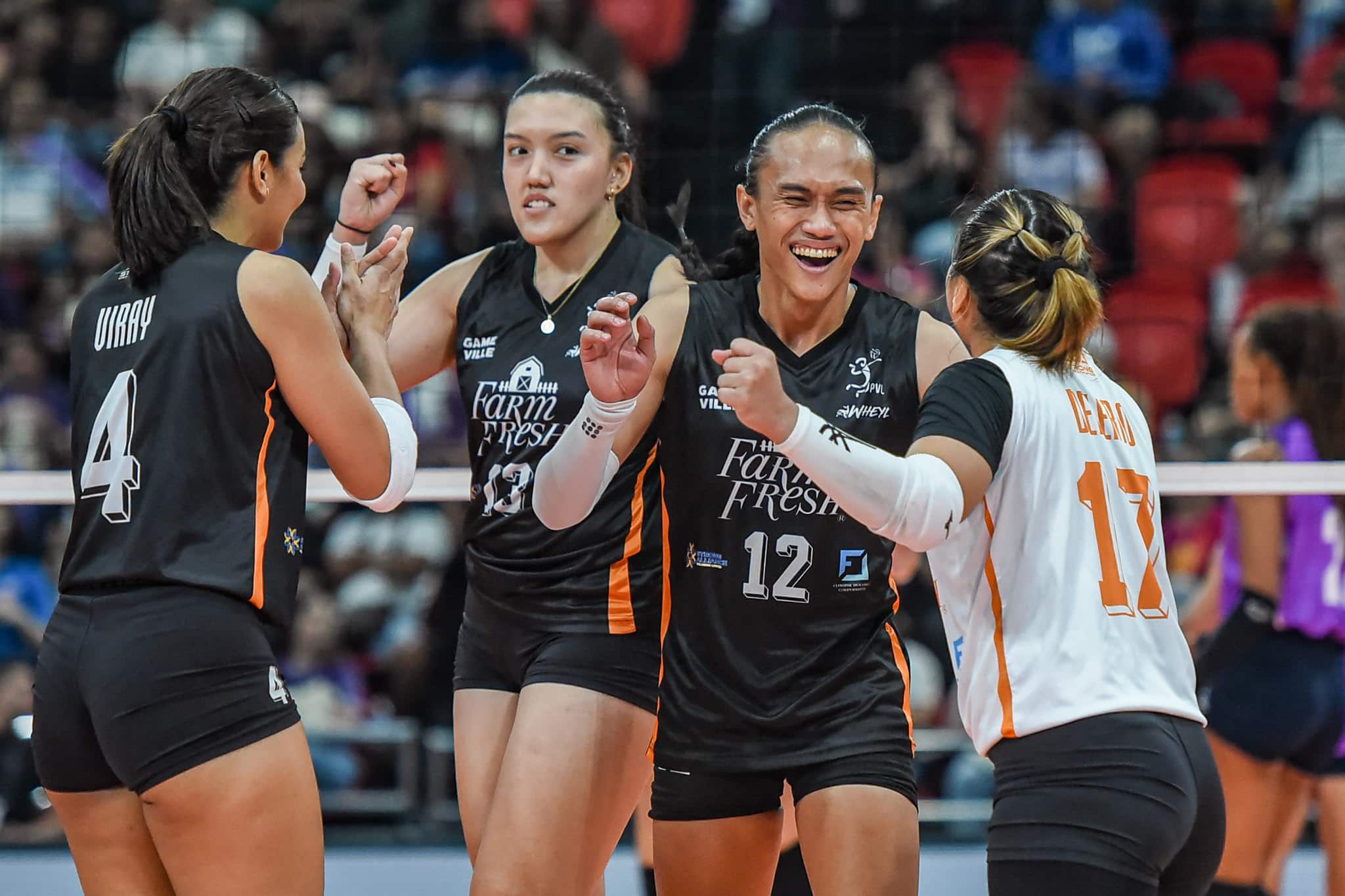 Trisha Tubu and Farm Fresh Foxies during during a PVL All-Filipino Conference game.